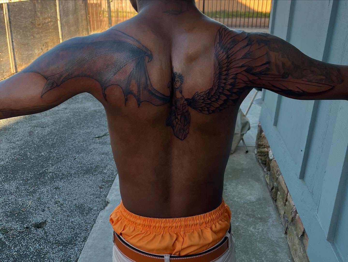 Bat and angel American traditional tattoo on the back by Bris