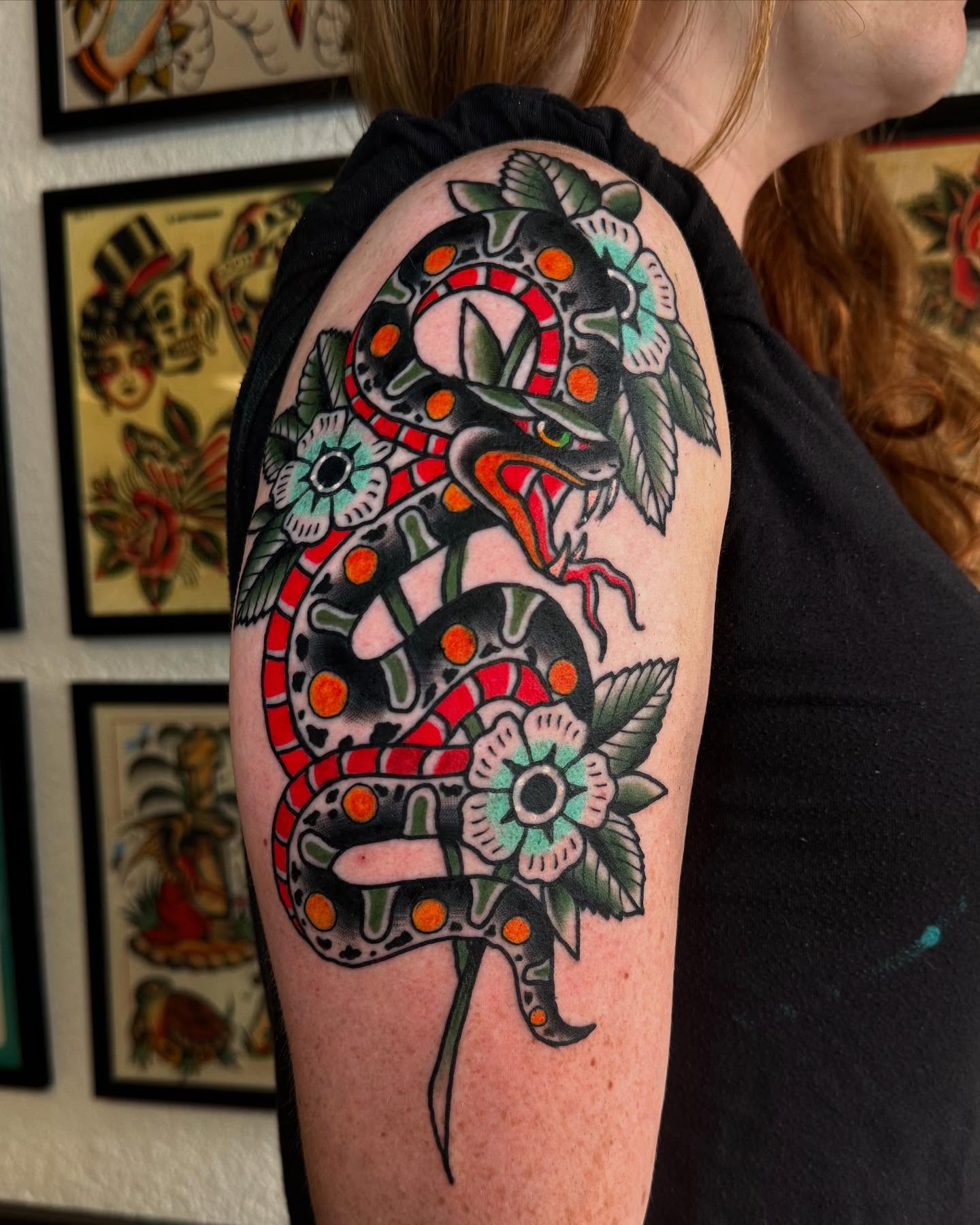 Snake and flowers American traditional tattoo on the forearm by Noah Diffenderfer, Phoenix, Arizona