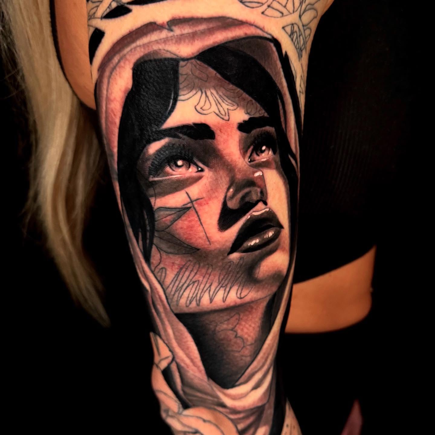 Woman's face realism tattoo on the forearm by Sweets, Nashville, Tennessee