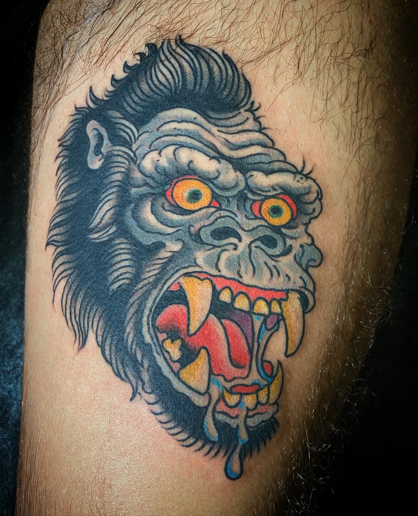 Gorilla head American traditional tattoo on the forearm by Adam Warmerdam, Los Angeles, California