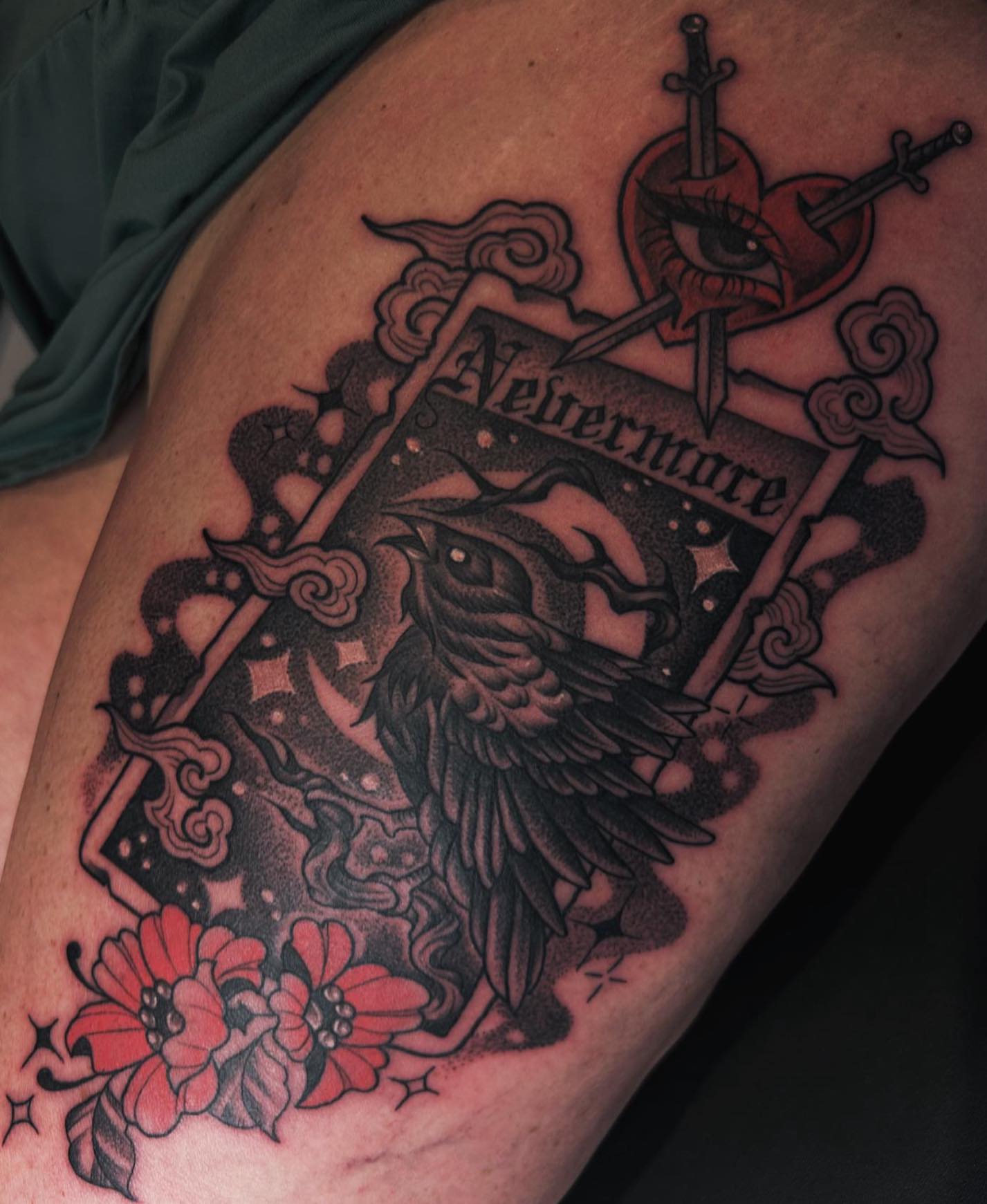 Nevermore raven American traditional tattoo on the thigh by Anna Nicole Thomas