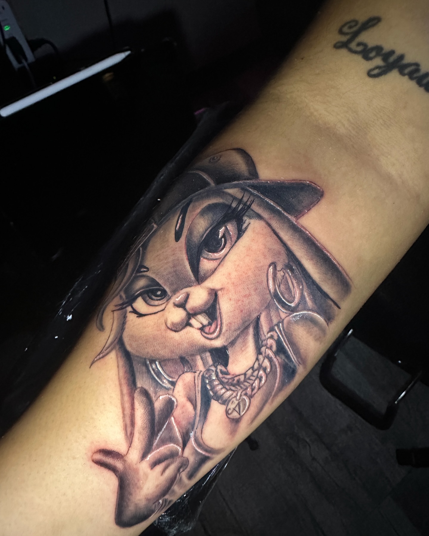 Rabbit wearing hat realism tattoo on the forearm by jersey ink tattoos, Elizabeth, New Jersey