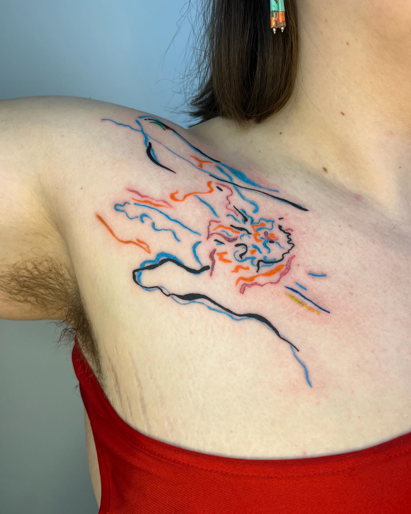 Abstract design new school tattoo on the shoulder by tattoos by quin