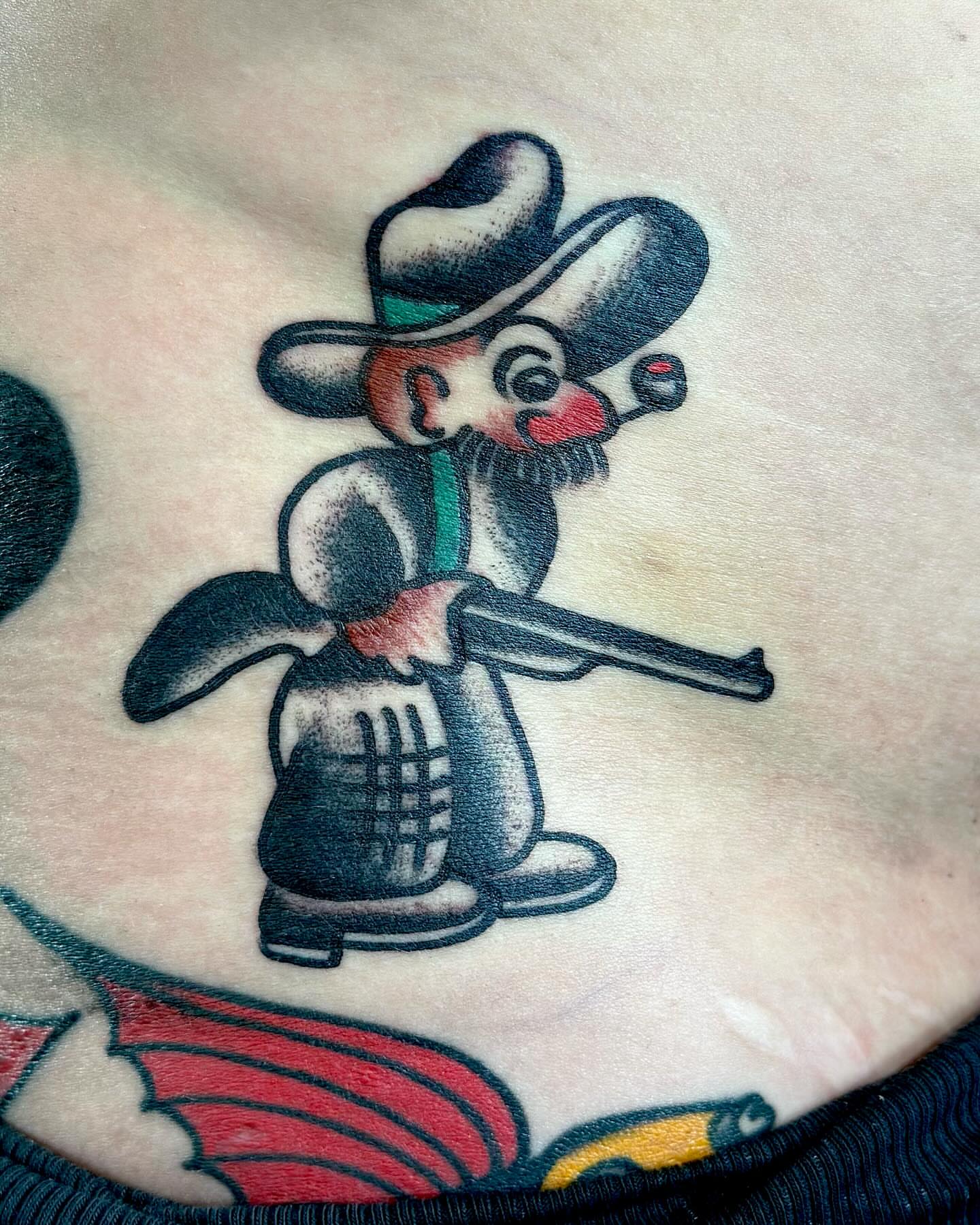 Cowboy mouse American traditional tattoo on the torso by San Diego tattoo artist