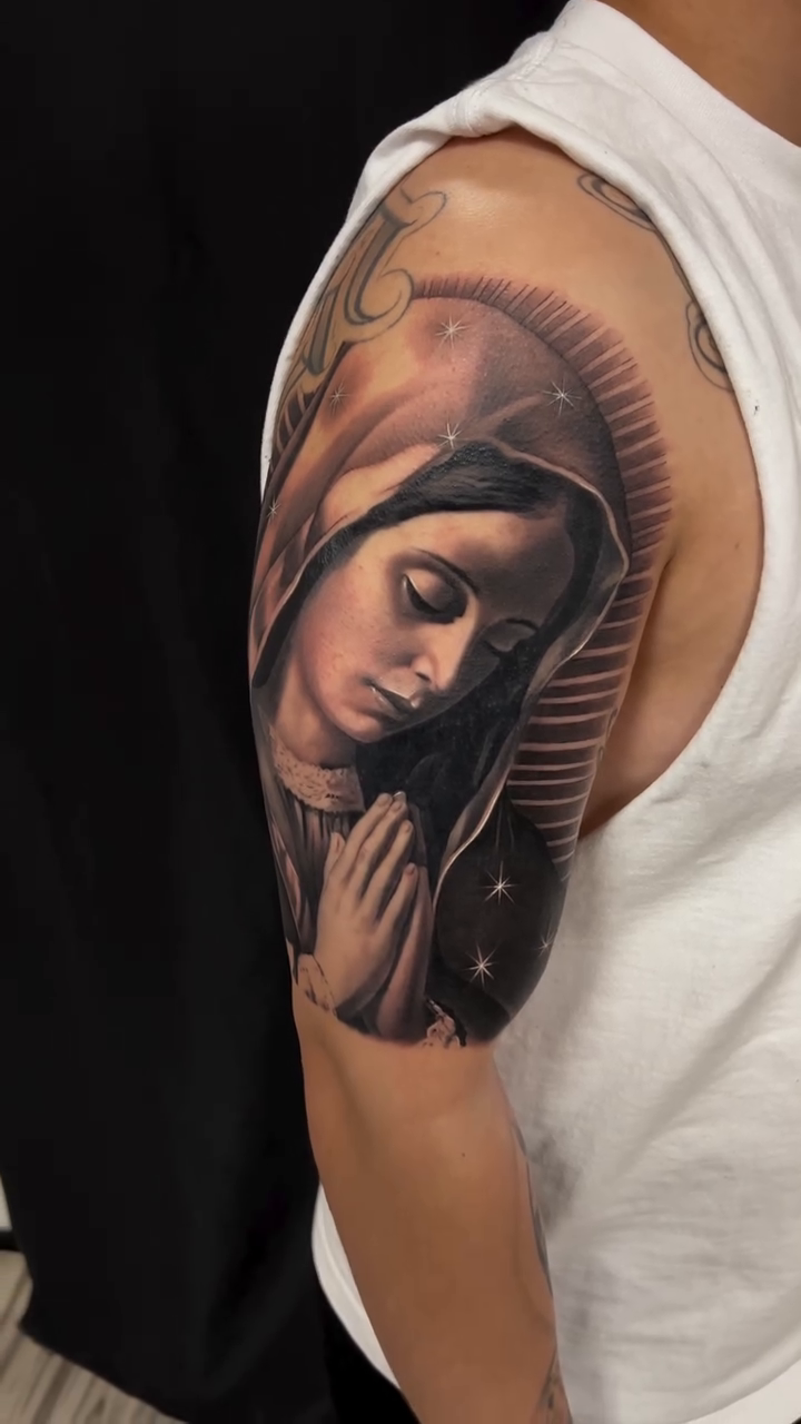 Virgin Mary realism tattoo by Thomas Conard