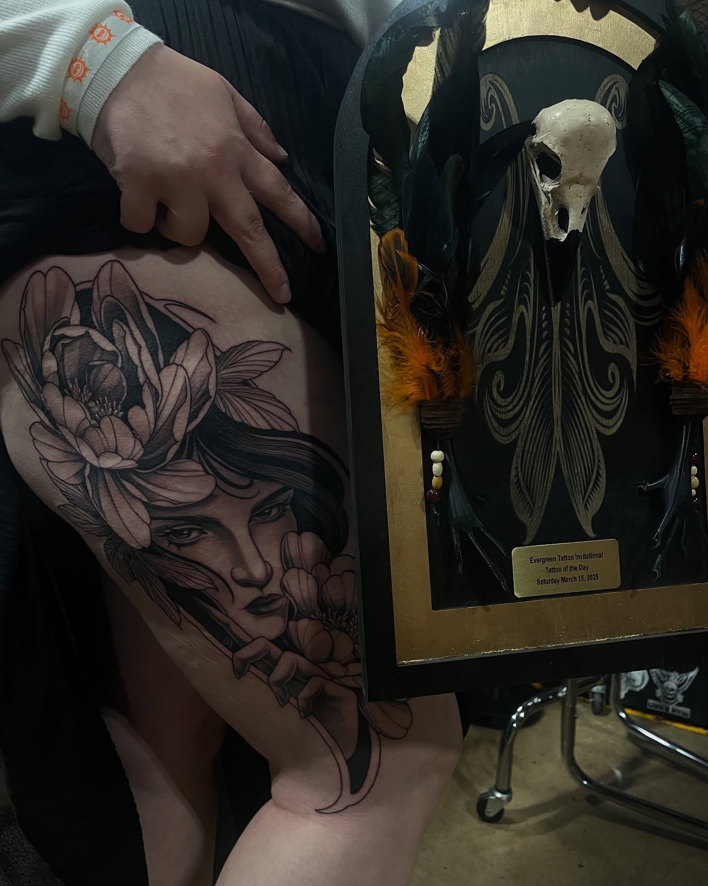 Woman with flowers realism tattoo on the thigh by Madelyn Roberts, Bellingham, Washington