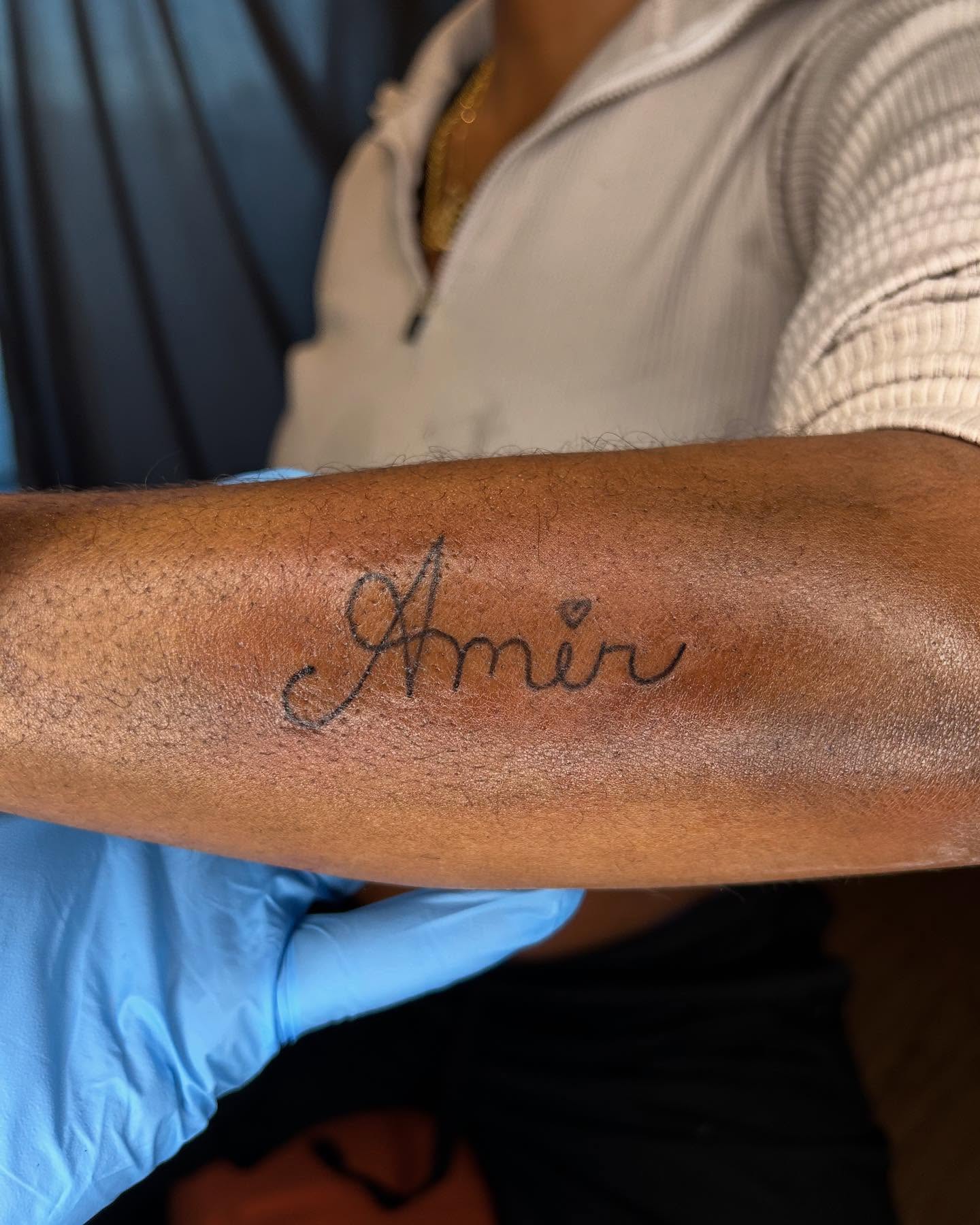 Amir lettering script tattoo on the forearm by 702tattoo💉🩸
