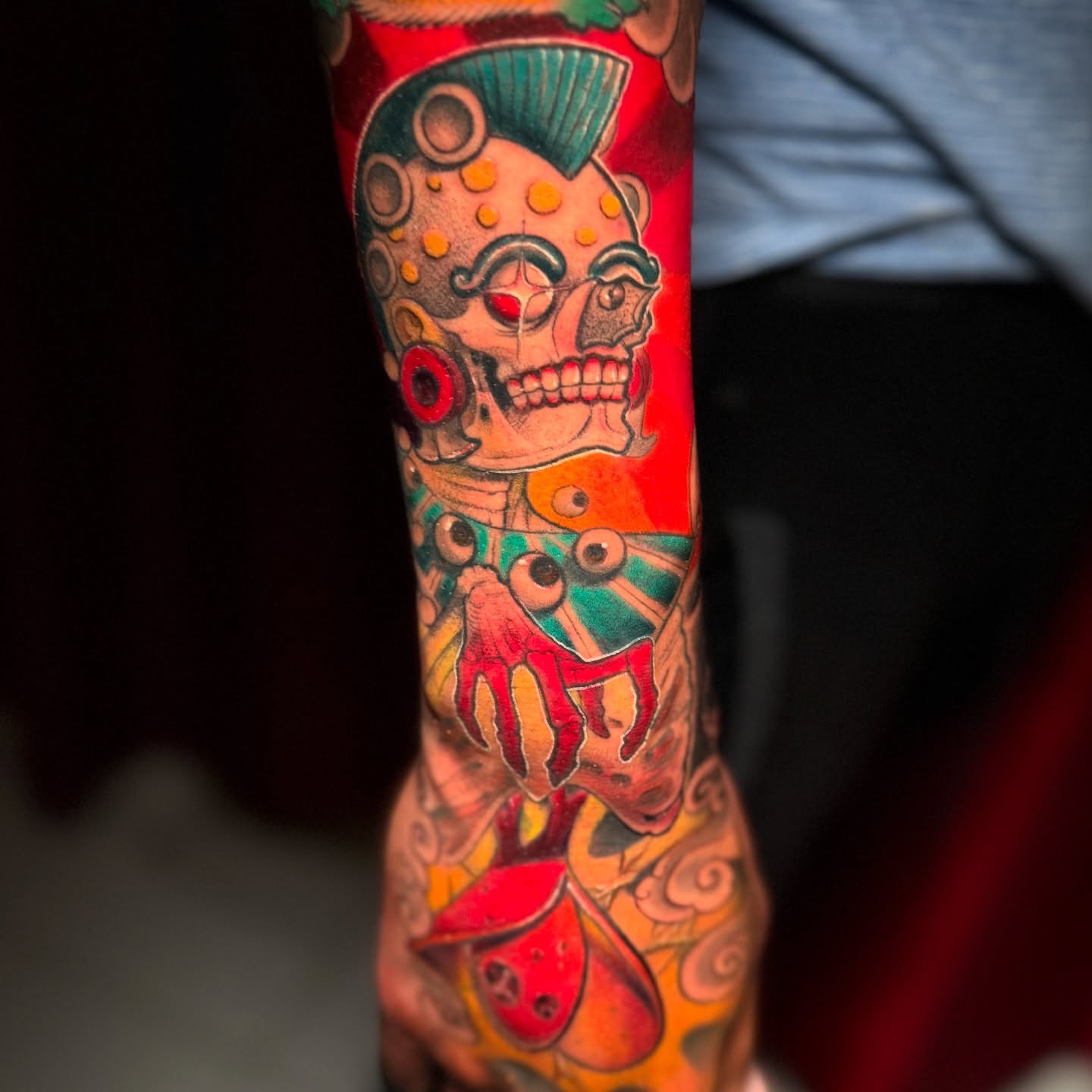 Skull with tentacles American traditional tattoo on the forearm by Meza Cruz