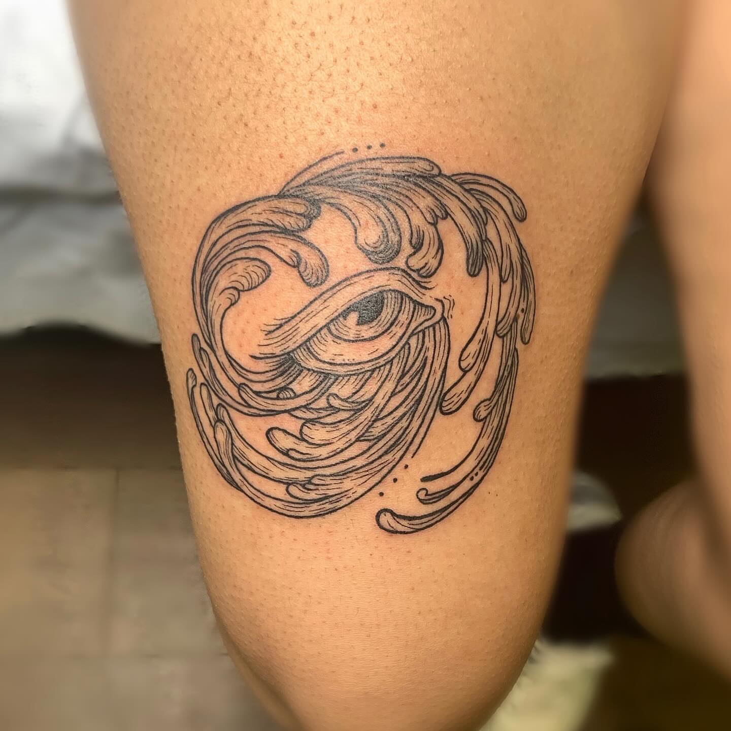 Eye dotwork tattoo on the thigh by Ava Glory Tattoos