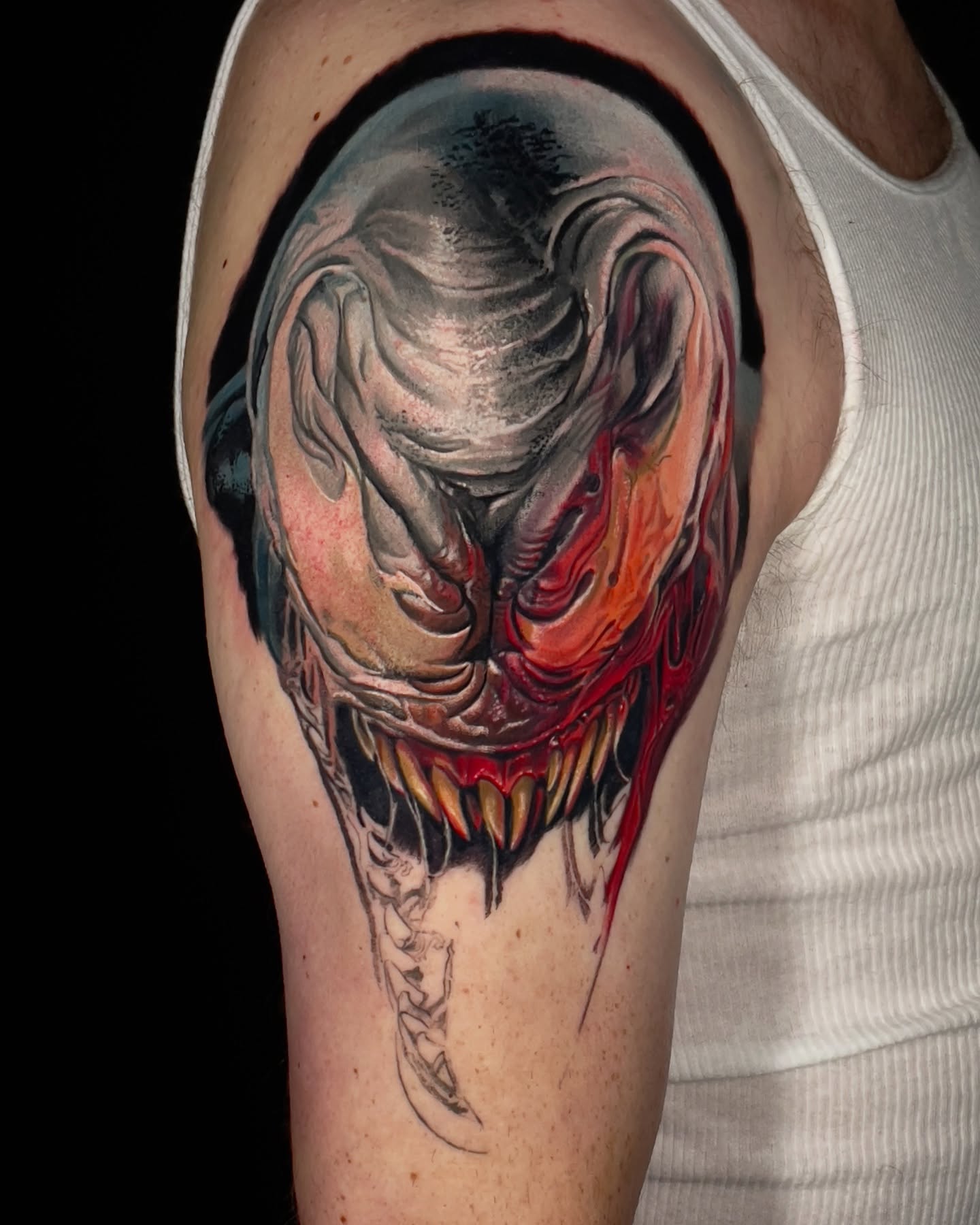 Demon mask dark realism tattoo on the shoulder by Robert Morton, Cleveland, Ohio