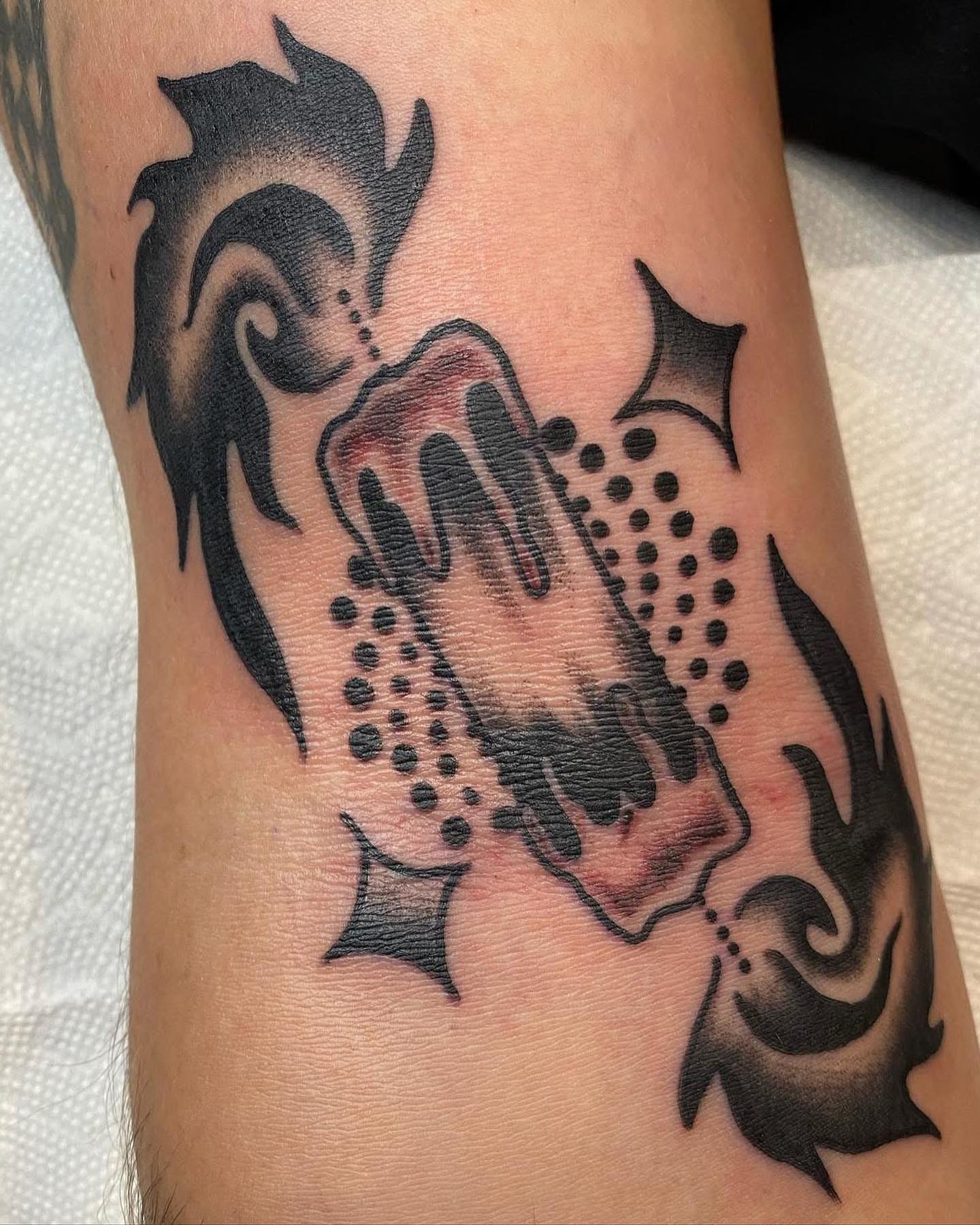 Fish dotwork tattoo on the forearm by Alex Lang
