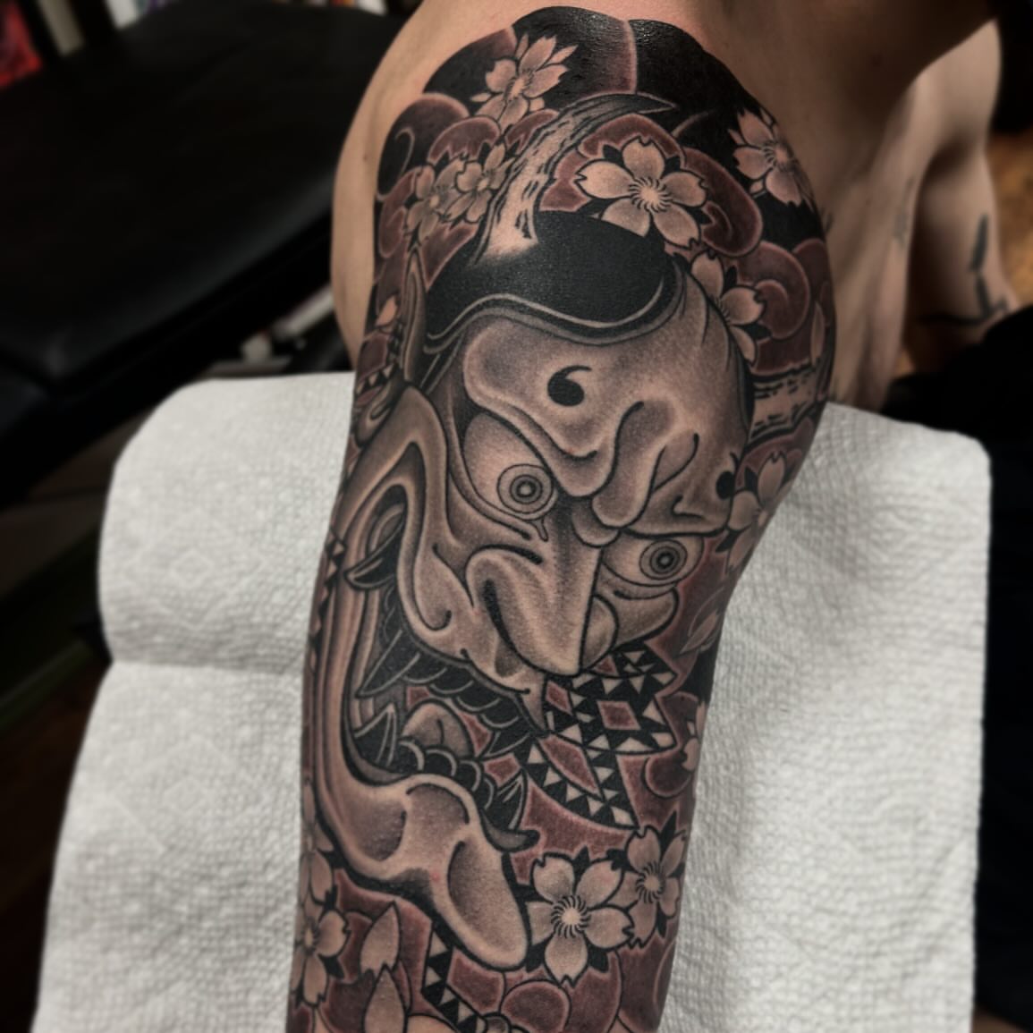 Japanese mask japanese irezumi tattoo on the forearm by Pat Moser