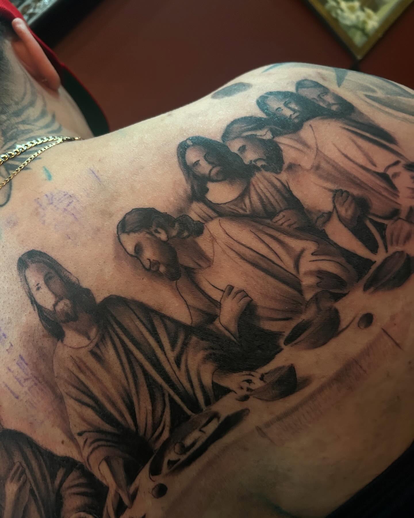 Religious scene realism tattoo on the back by Carlos