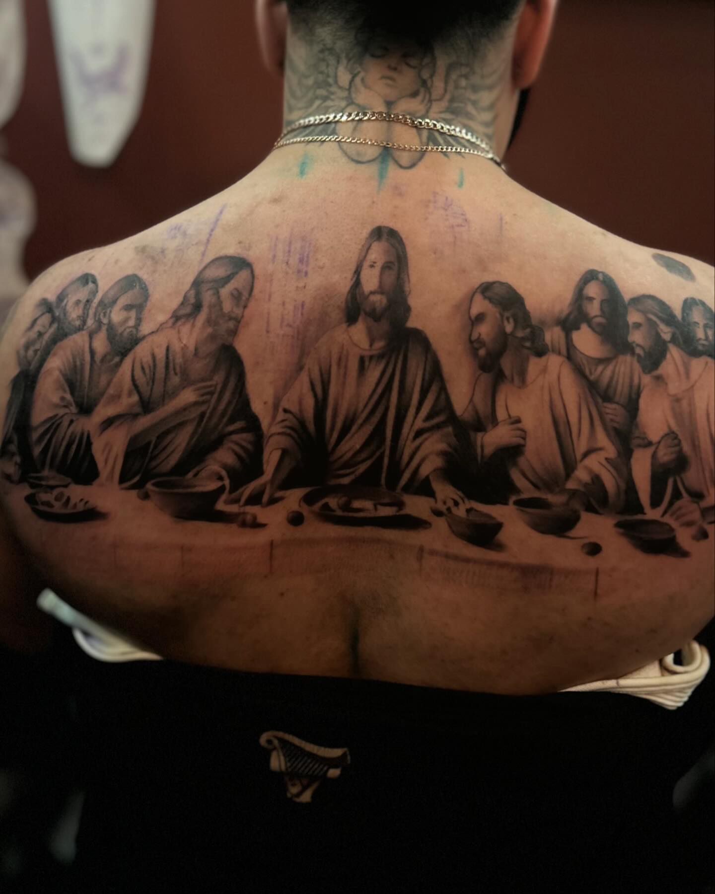Last supper black and grey tattoo on the back by Carlos
