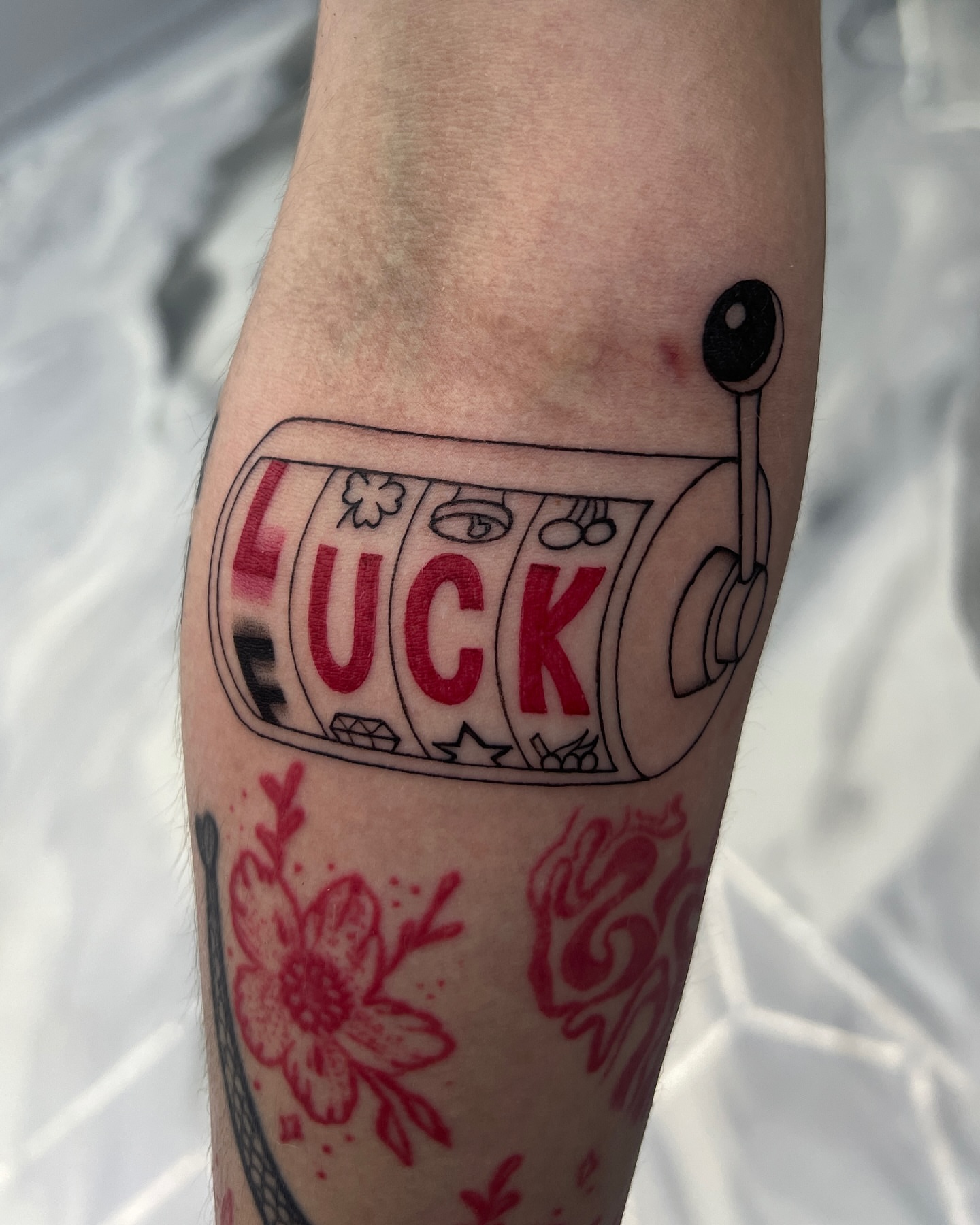 Slot machine American traditional tattoo on the forearm by Eyekonic Ink