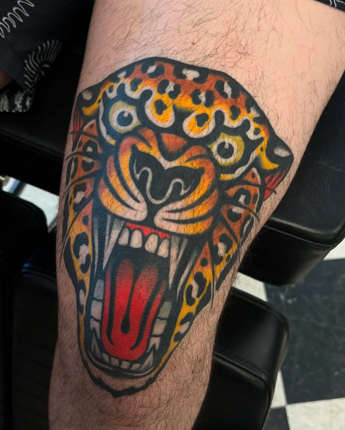 Jaguar head American traditional tattoo on the forearm by Arturo Ledesma