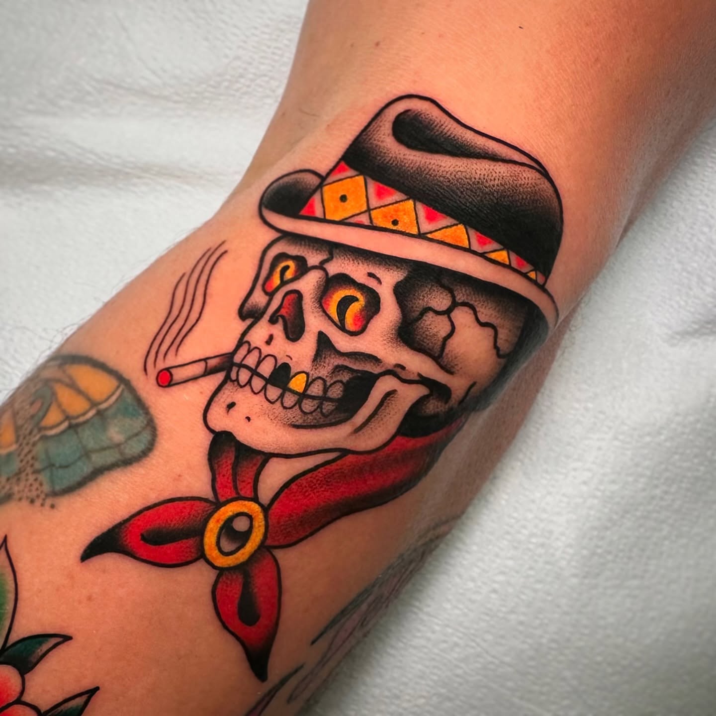 Skull wearing sombrero American traditional tattoo on the forearm by Patrick Whiting