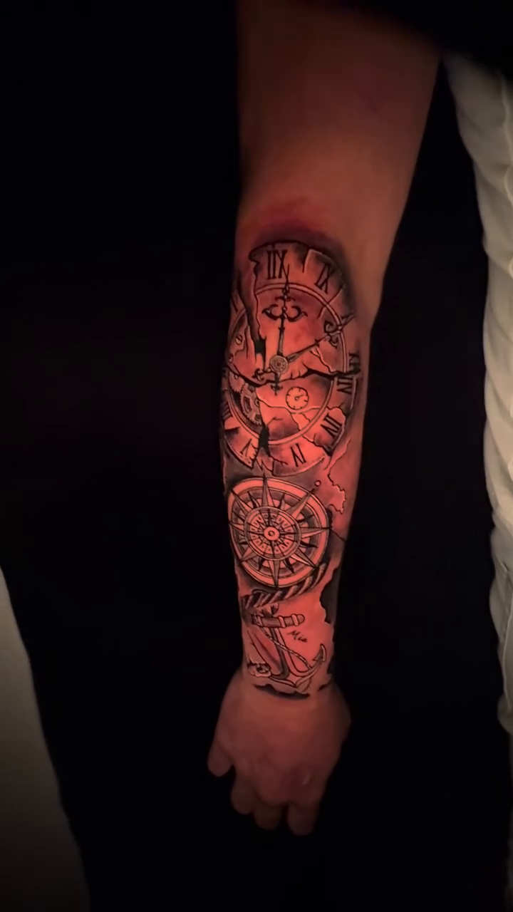 Clock, compass, and anchor sleeve realism tattoo on the forearm by Aldocasales@tatto