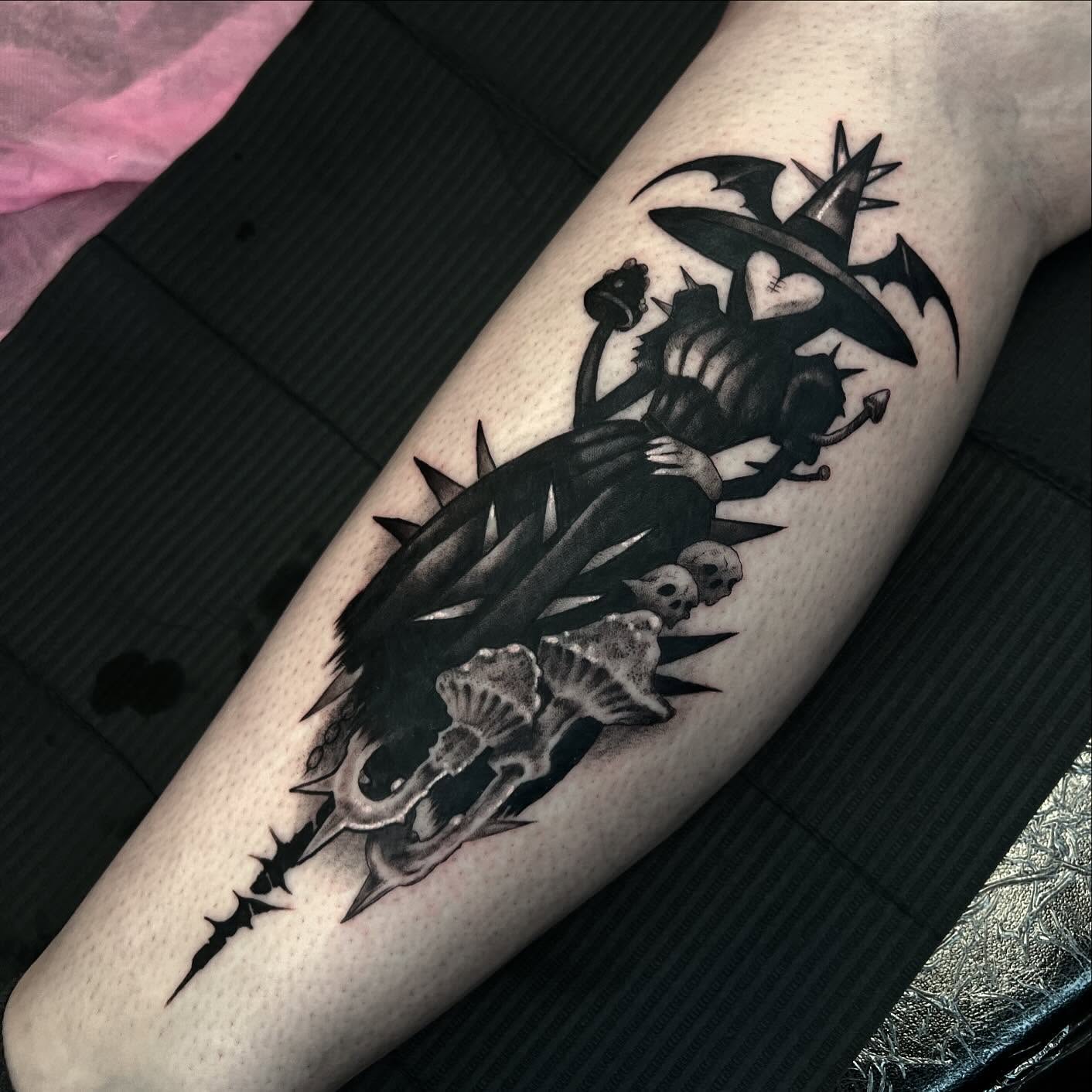Witch and skulls dark realism tattoo on the forearm by Briana Walker