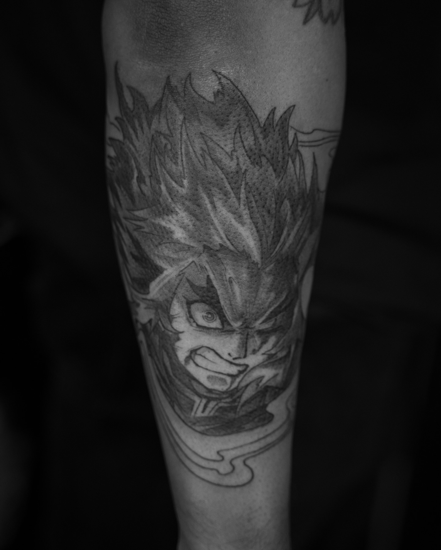 Anime character anime tattoo on the forearm by Chris Estrada