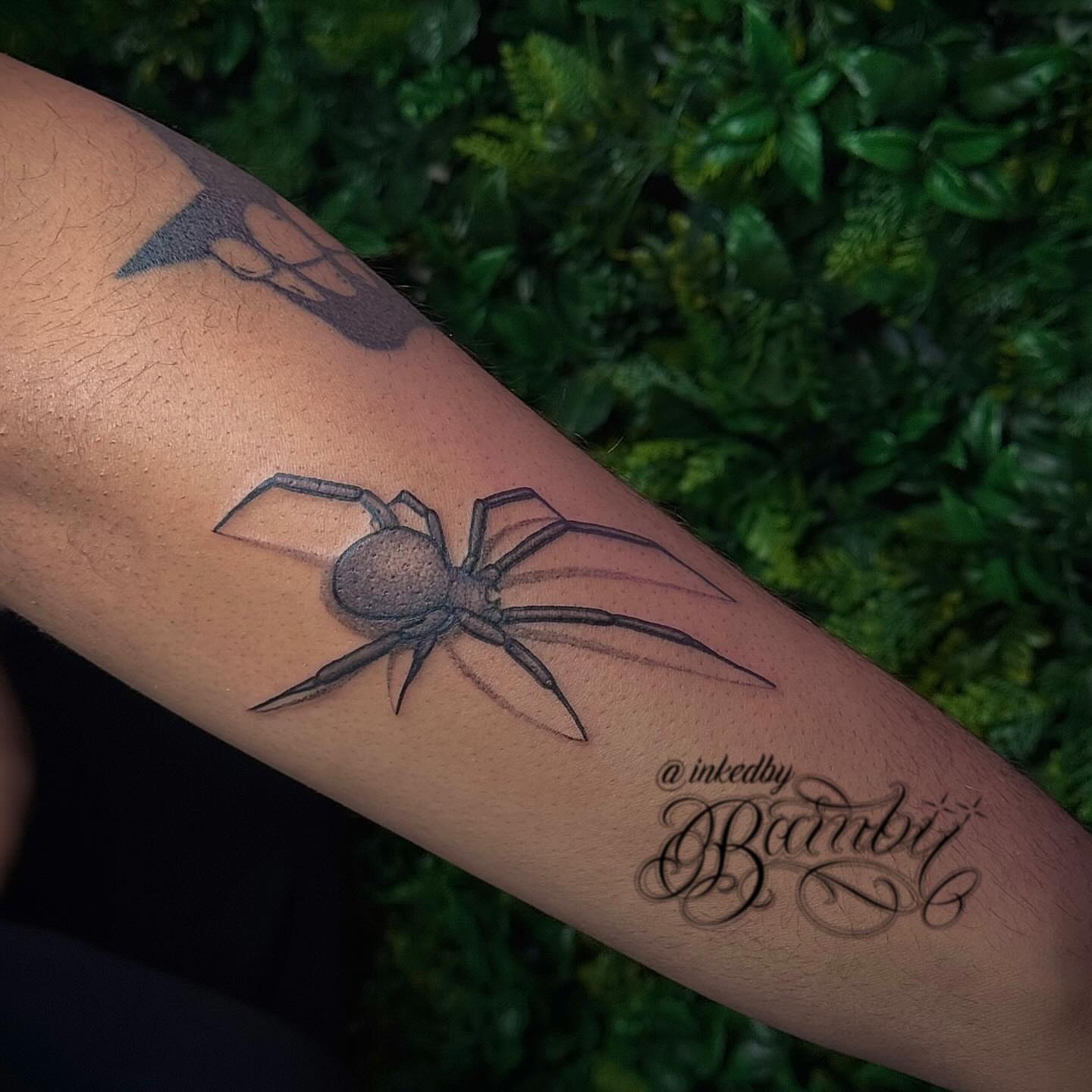 Spider black and grey tattoo on the forearm by Ember
