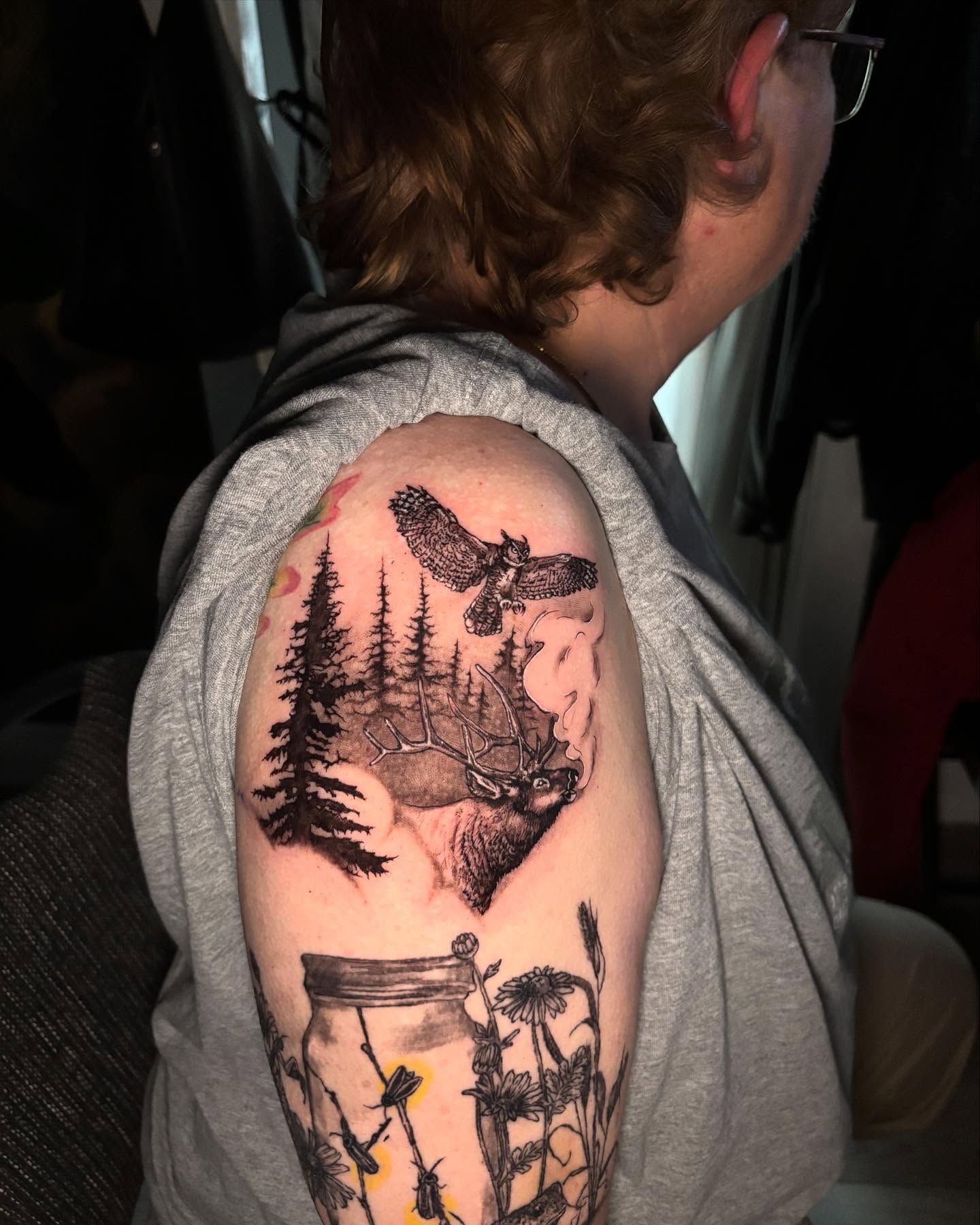 Deer and forest black and grey tattoo on the shoulder by Kayla