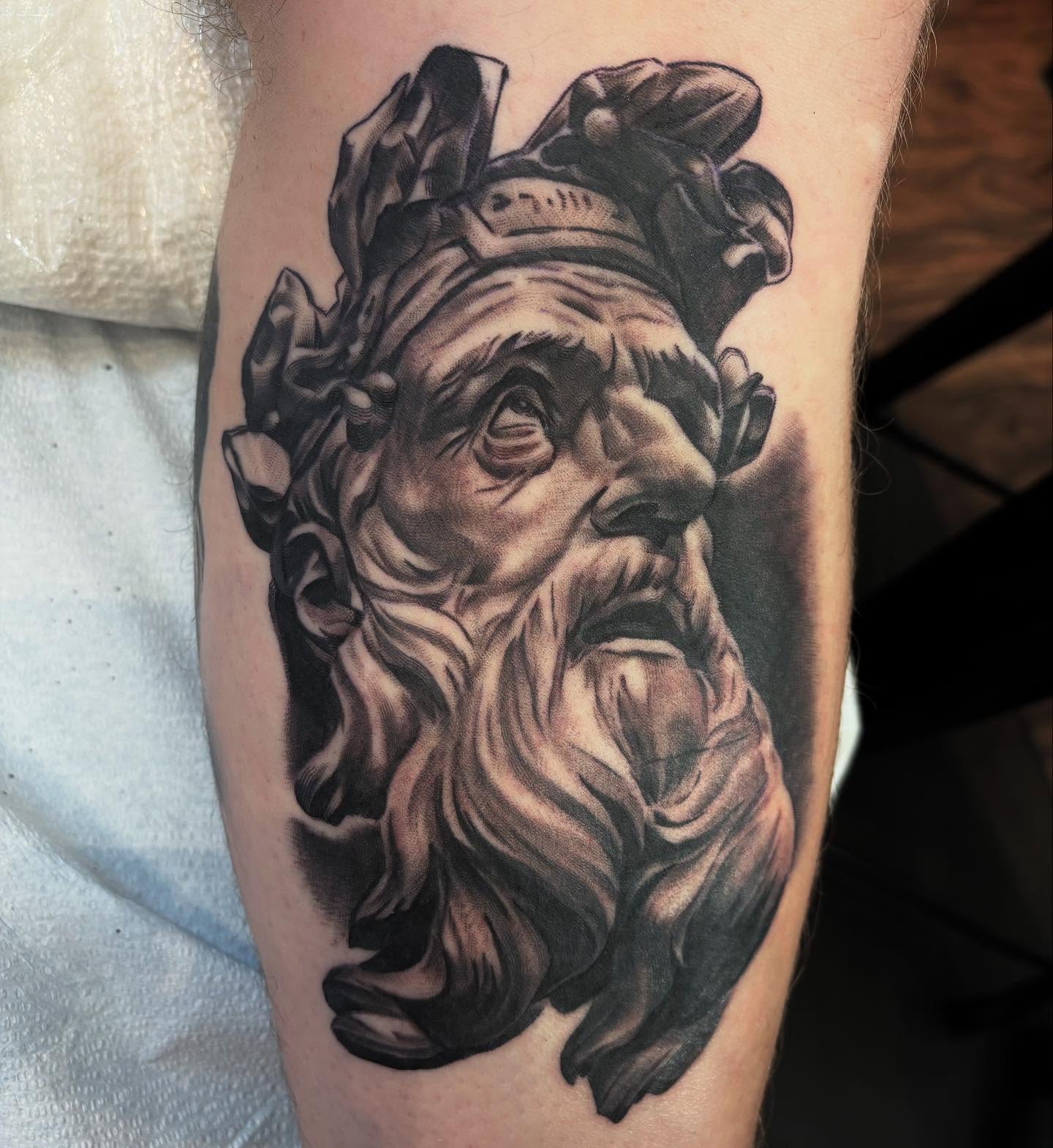 Ancient god realism tattoo on the forearm by Mike Doherty, Abington, Massachusetts