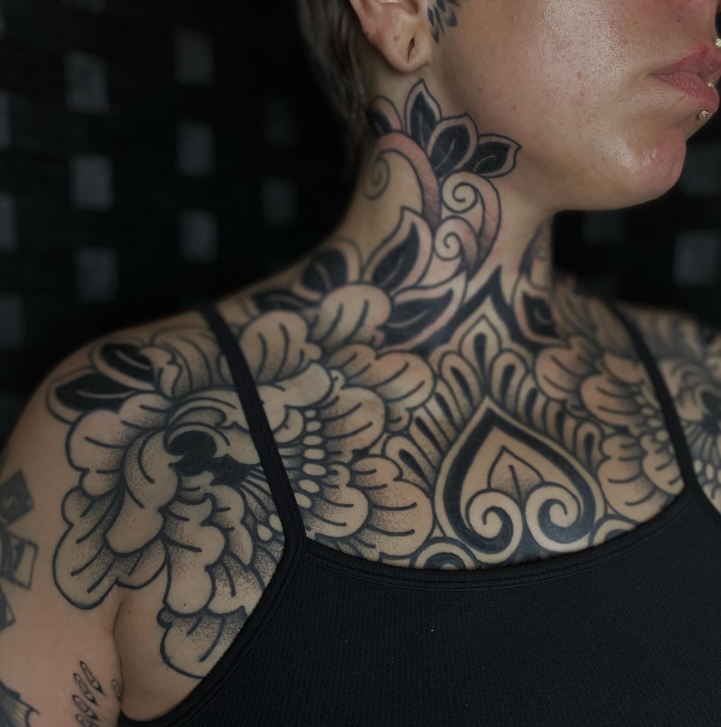 Floral mandala geometric tattoo on the chest by Veronica
