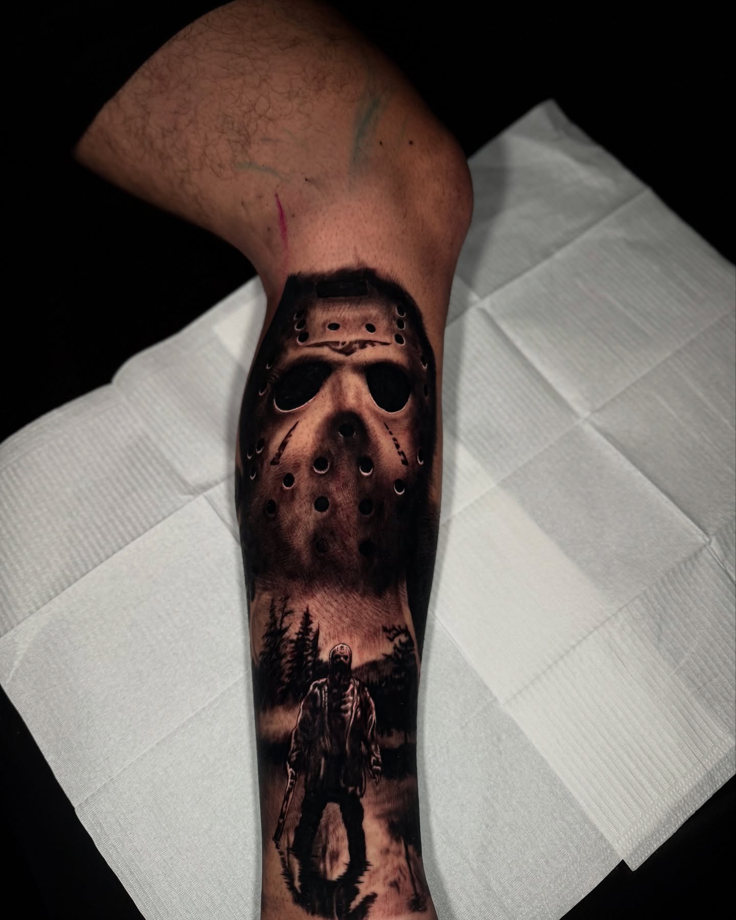 Jason voorhees dark realism tattoo on the forearm by Isaac