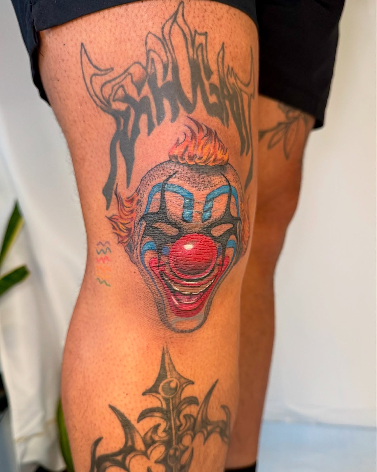 Clown face realism tattoo on the thigh by Franky A Bonifacio, Seattle, Washington