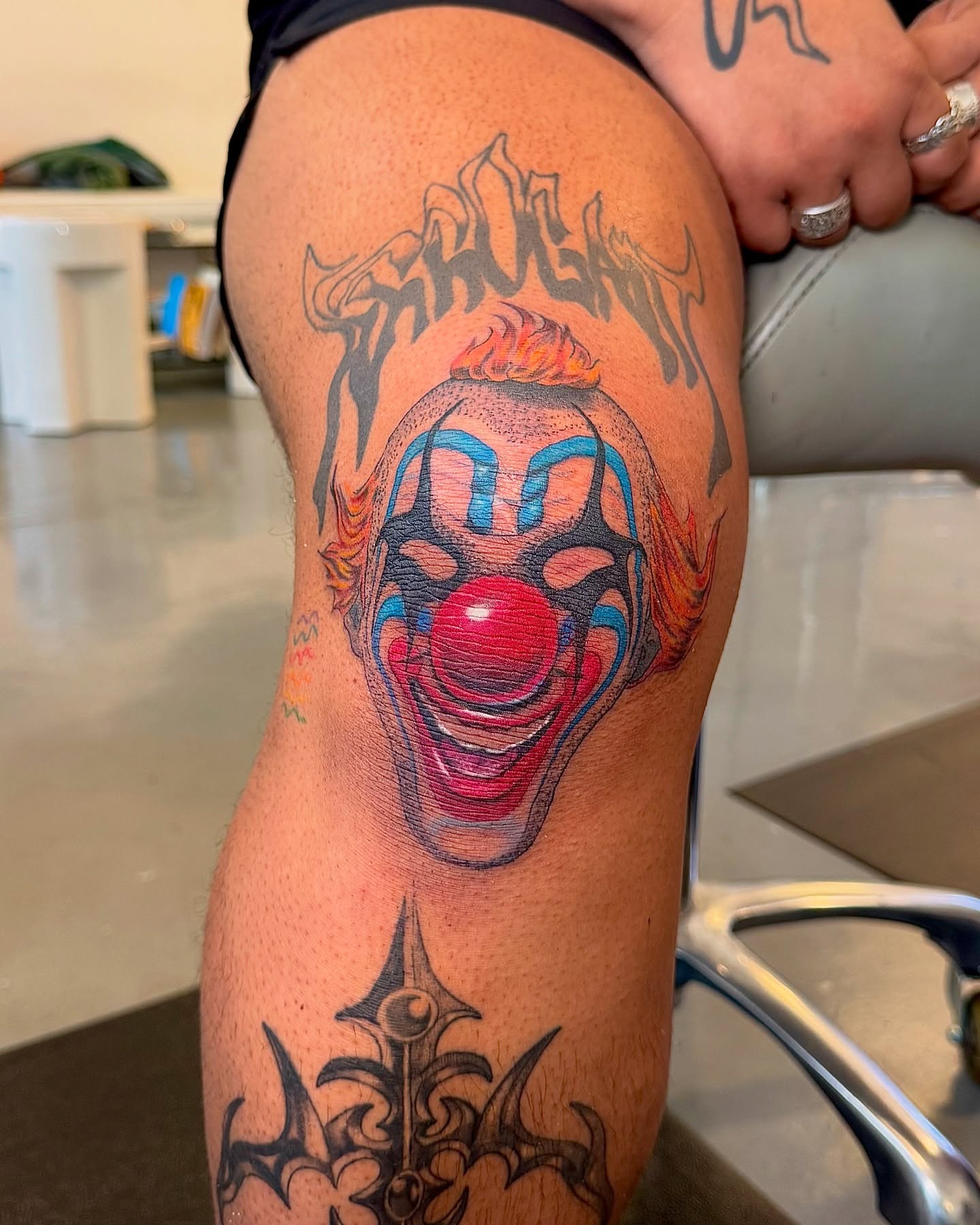 Clown face realism tattoo on the thigh by Franky A Bonifacio, Seattle, Washington