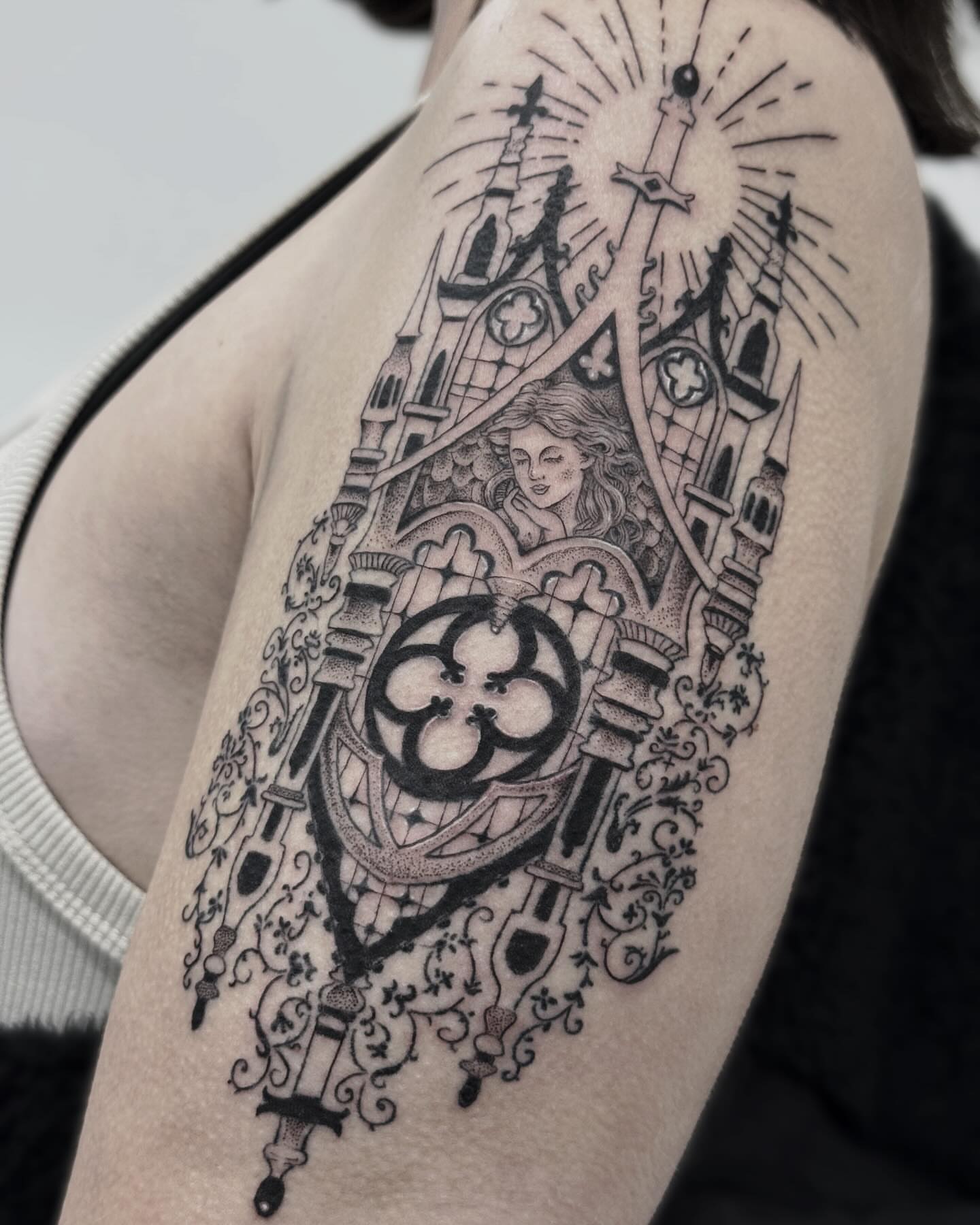 Gothic cathedral geometric tattoo on the shoulder by Writhe Grey