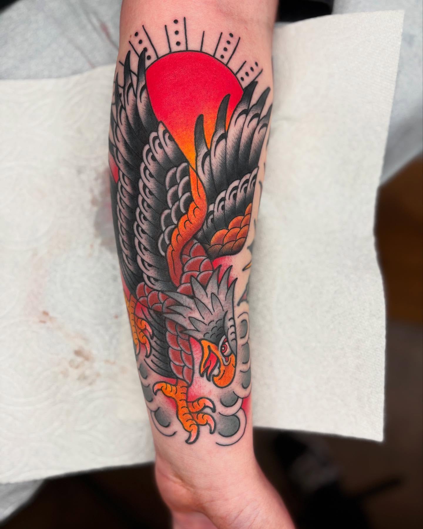 Eagle American traditional tattoo on the forearm by Cody Collins