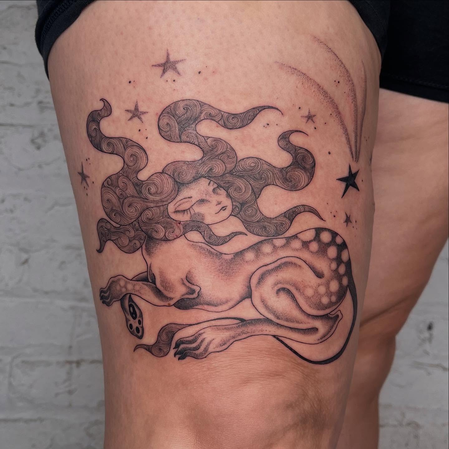 Mermaid dotwork tattoo on the thigh by 𝔇𝔢𝔰𝔦