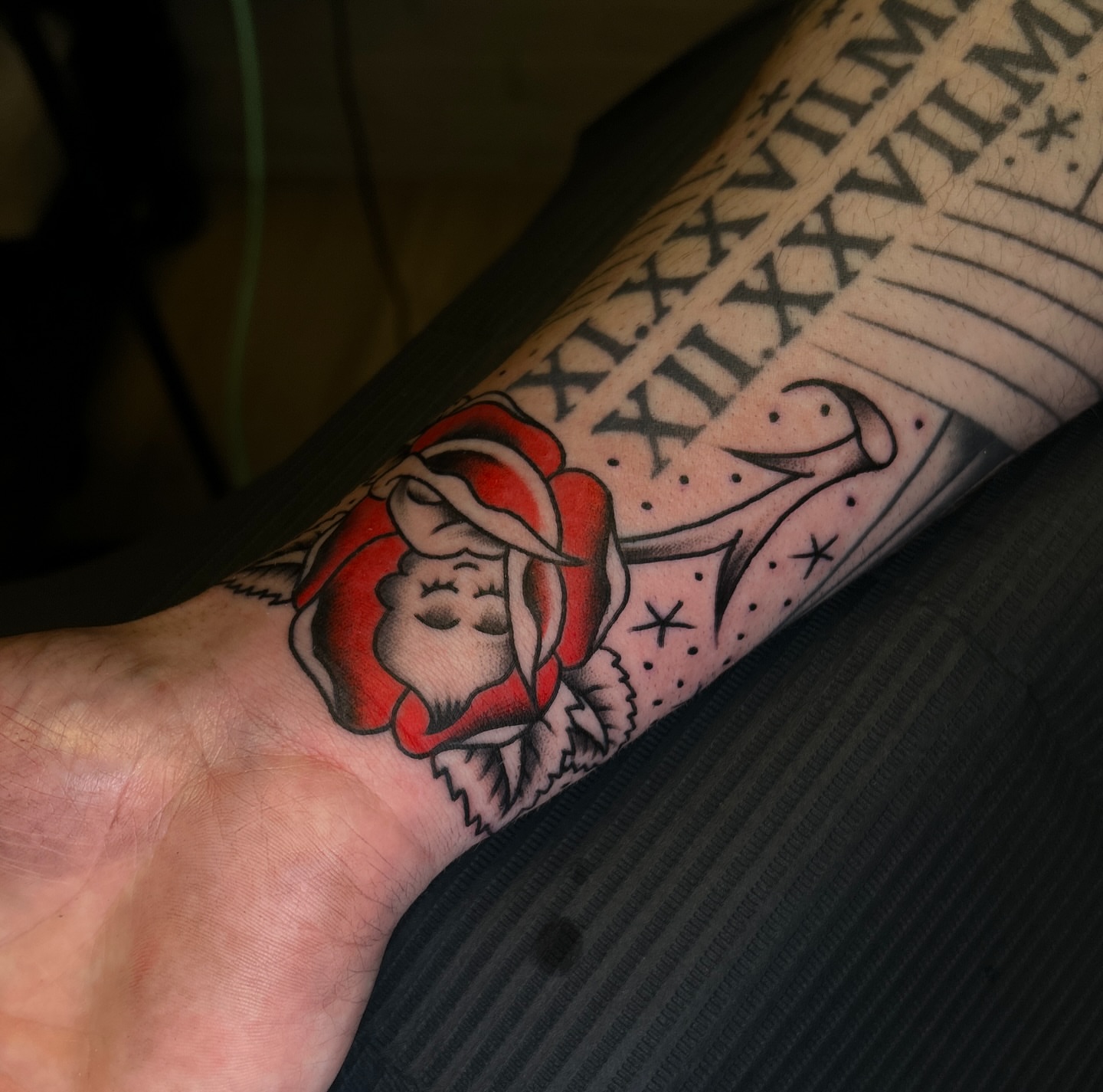 Woman in rose American traditional tattoo on the forearm by Preston-NJ Tattoo Artist