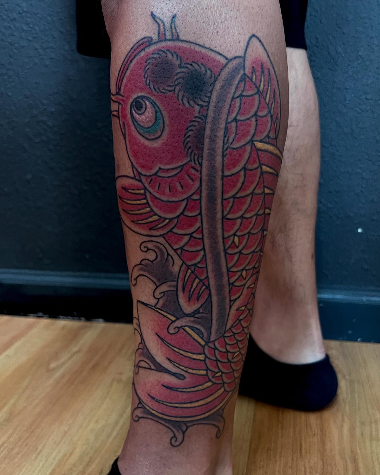 Koi fish japanese irezumi tattoo on the calf by Rocky Burley, Georgetown, Texas