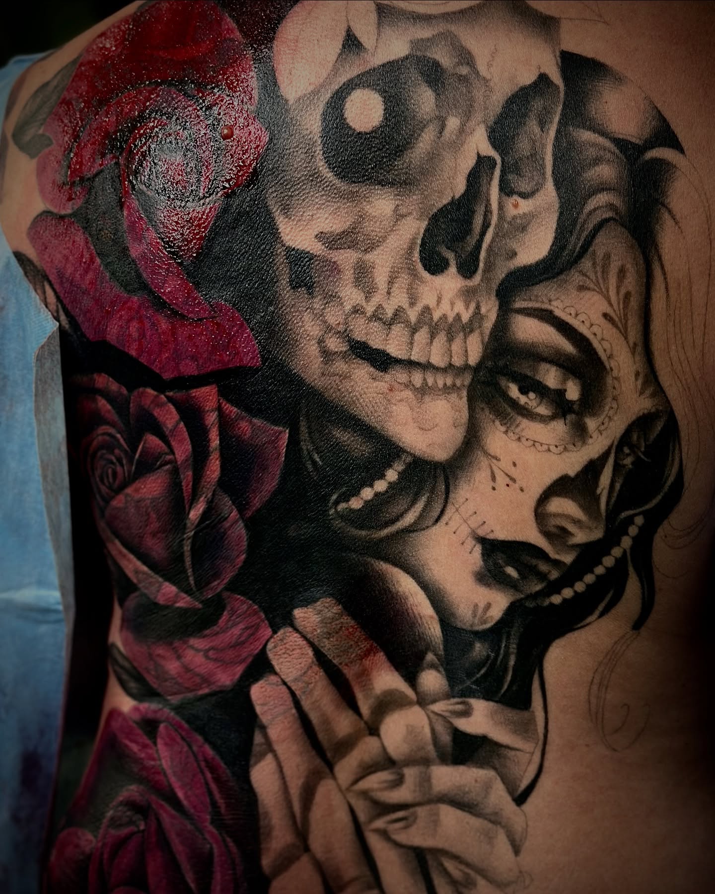 Skull and woman realism tattoo on the torso by Feliz Manzanedo, Prescott, Arizona