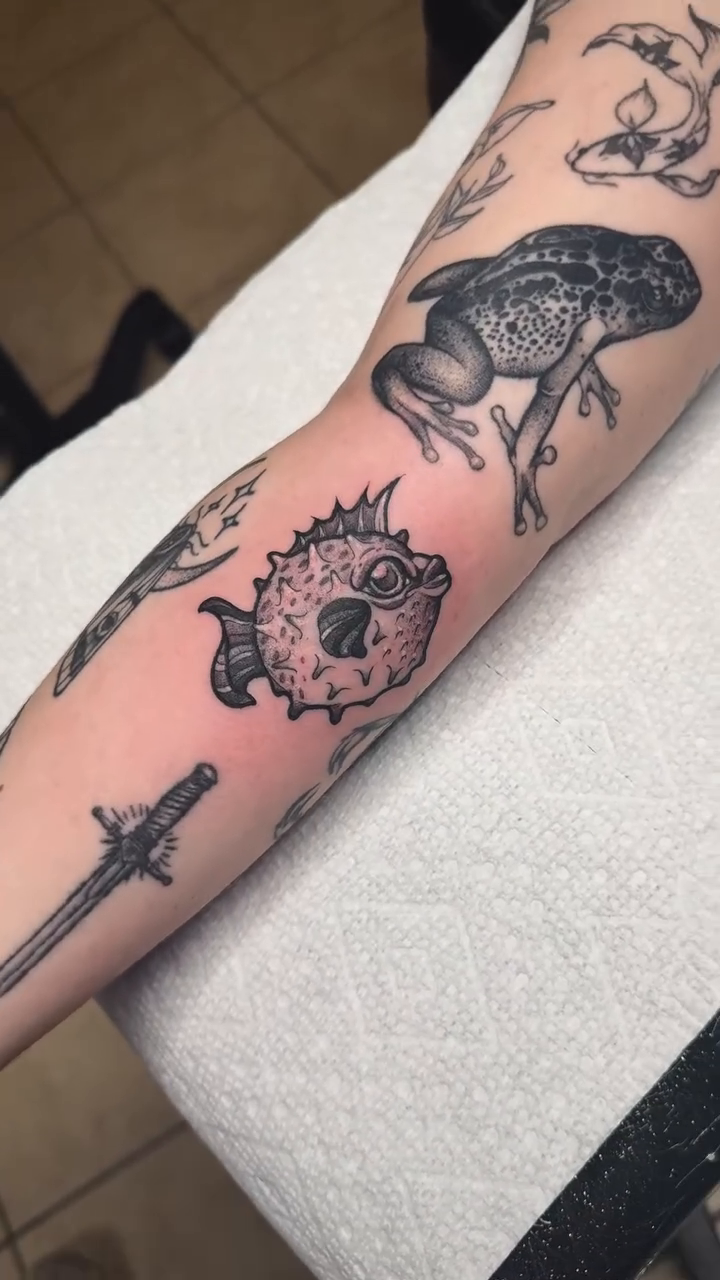 Pufferfish and frog realism tattoo by K9
