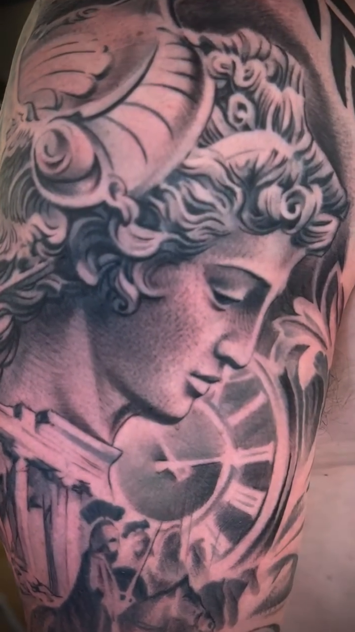Greek statue and clock realism tattoo by Mason Williams