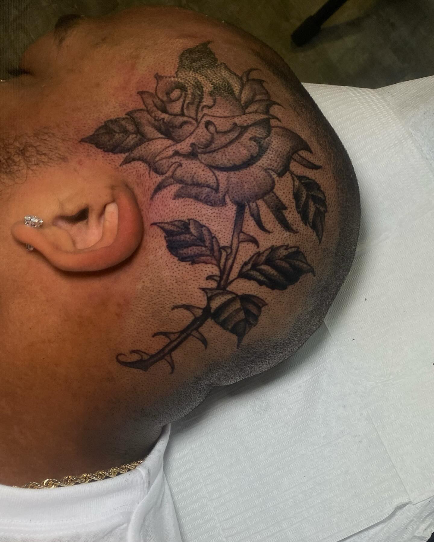 Rose dotwork tattoo on the chest by Chase Skylar Clayton Ogle