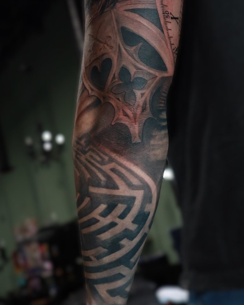 Geometric maze geometric tattoo on the forearm by Mike j tattooer