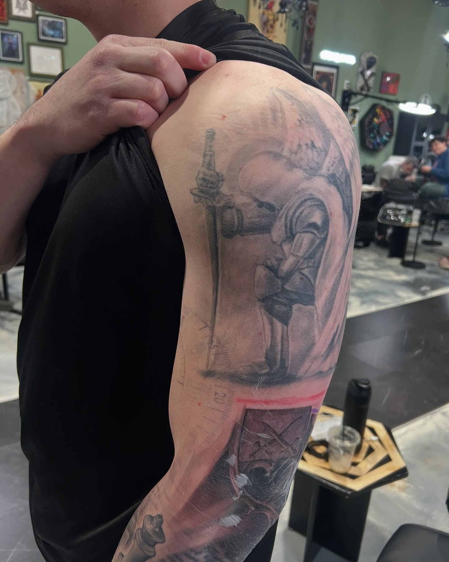 Tattoo by @mikejtattooer22 — realism, black_and_grey