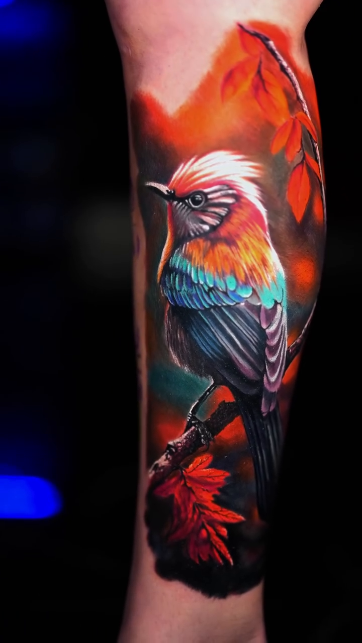 Bird on a branch with leaves realism tattoo by Yasmani ramirez
