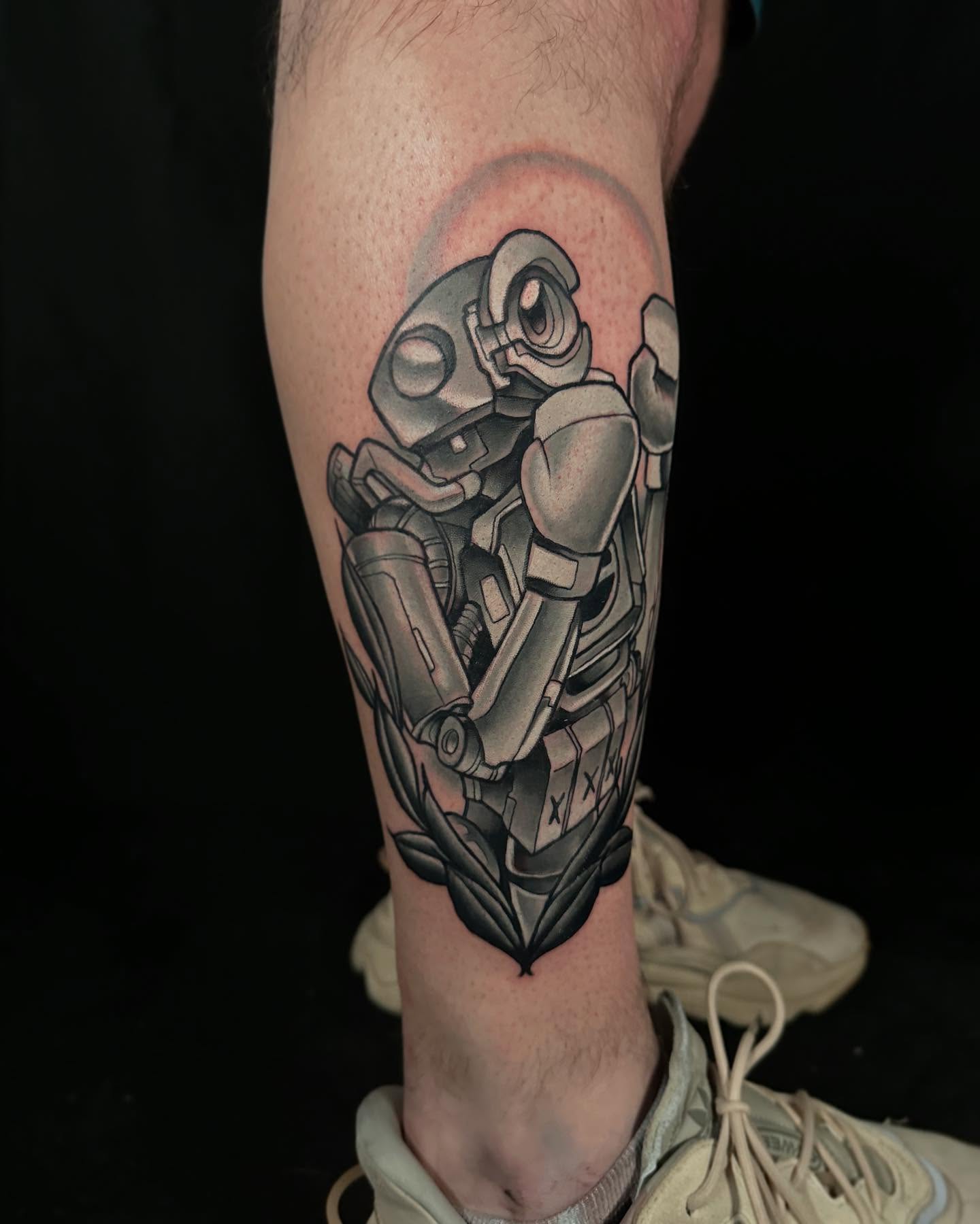 Mech black and grey tattoo on the forearm by John Milosh Chamberlin