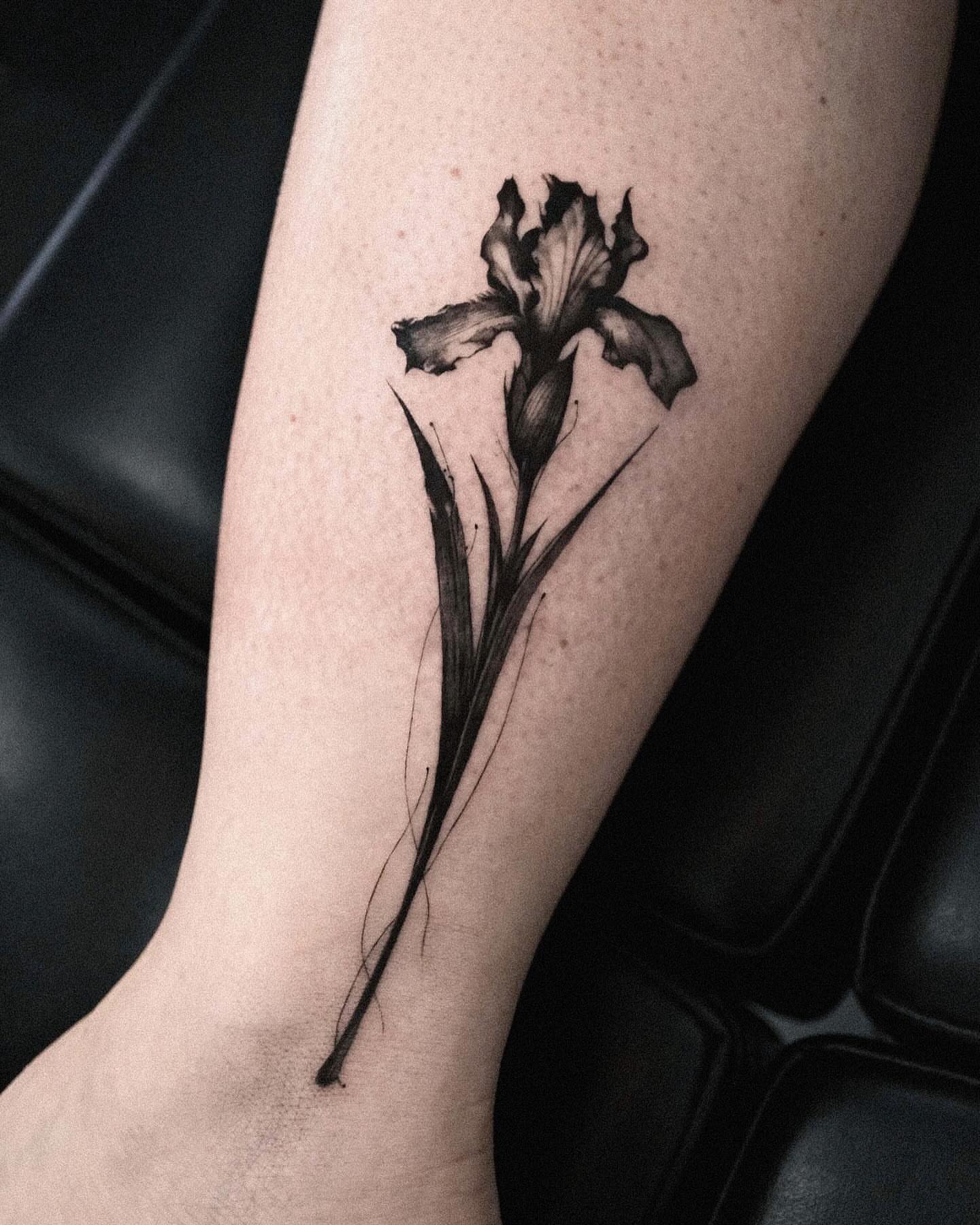 Iris realism tattoo on the forearm by 𝑴𝒆𝒍𝒐