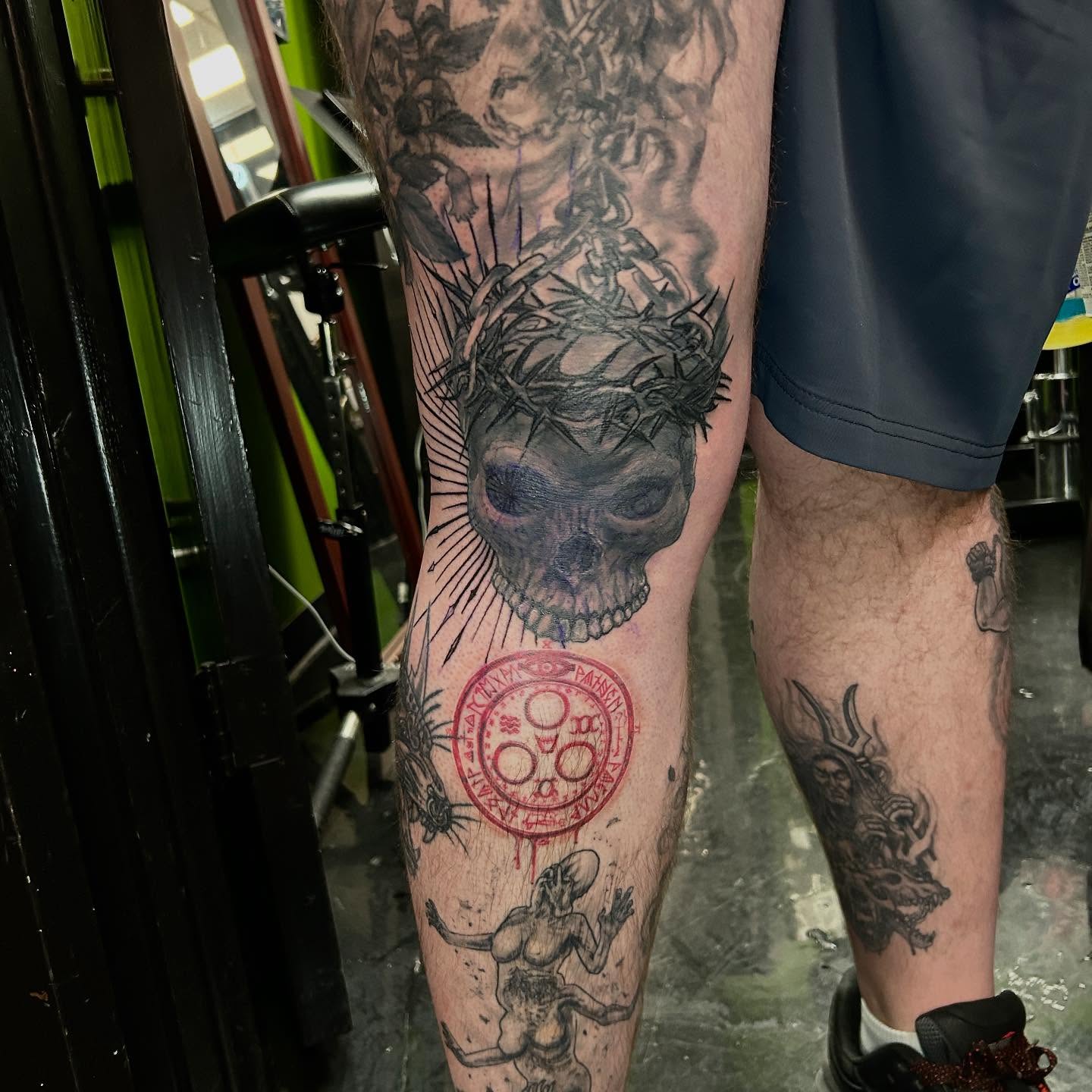 Skull with crown of thorns dark realism tattoo on the calf by B Hendrix, Cuyahoga Falls, Ohio