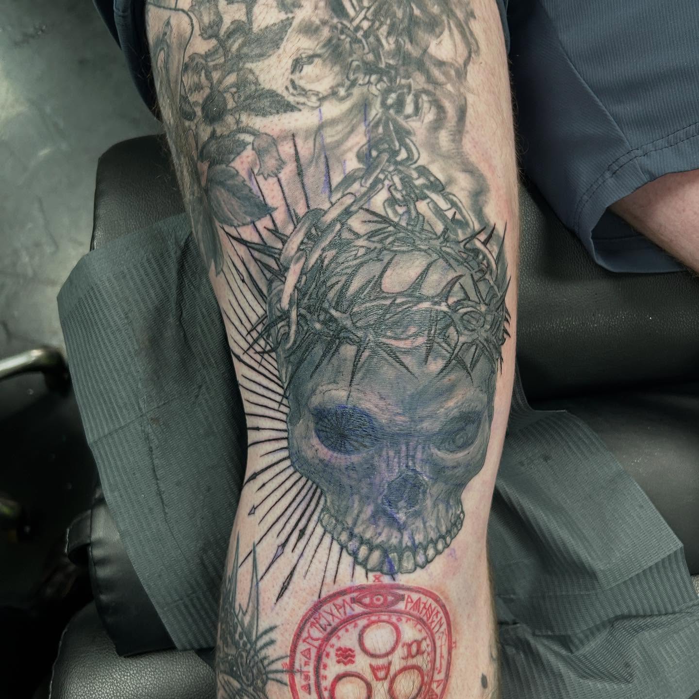 Skull with crown of thorns realism tattoo on the forearm by B Hendrix, Cuyahoga Falls, Ohio