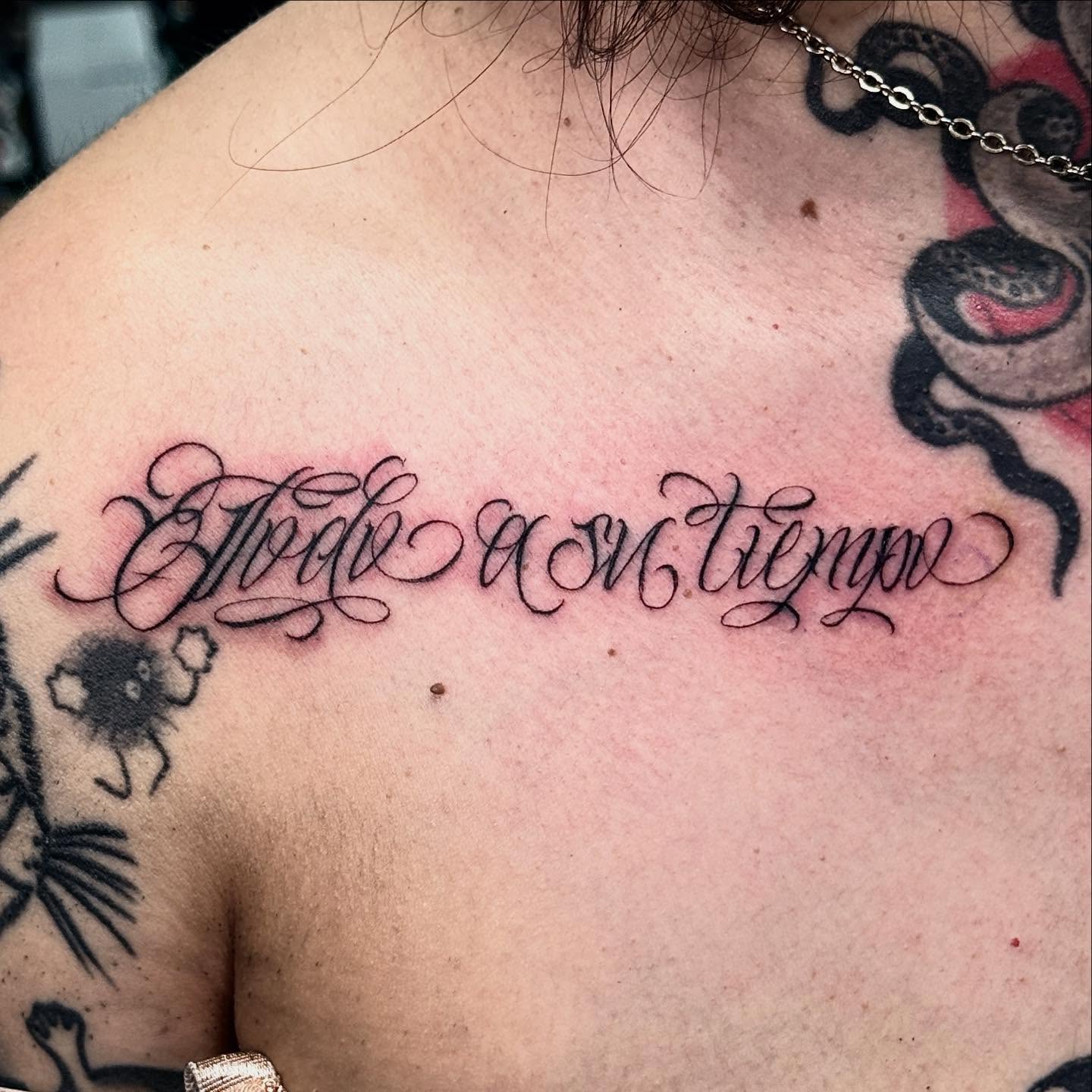 Script lettering lettering script tattoo on the chest by Joey Moreno