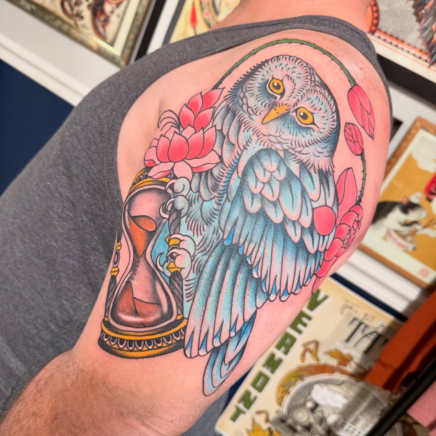 Owl and hourglass American traditional tattoo on the shoulder by Jhon