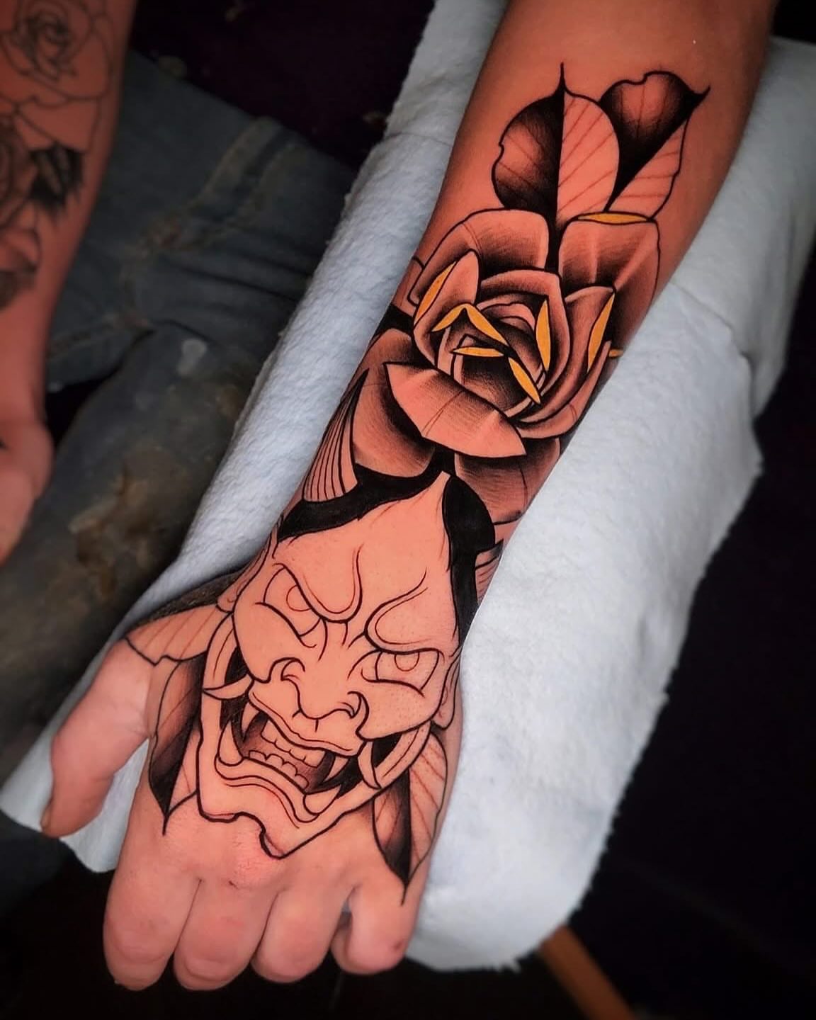 Demon mask and roses American traditional tattoo on the forearm by ⚔️ Shane ⚔️